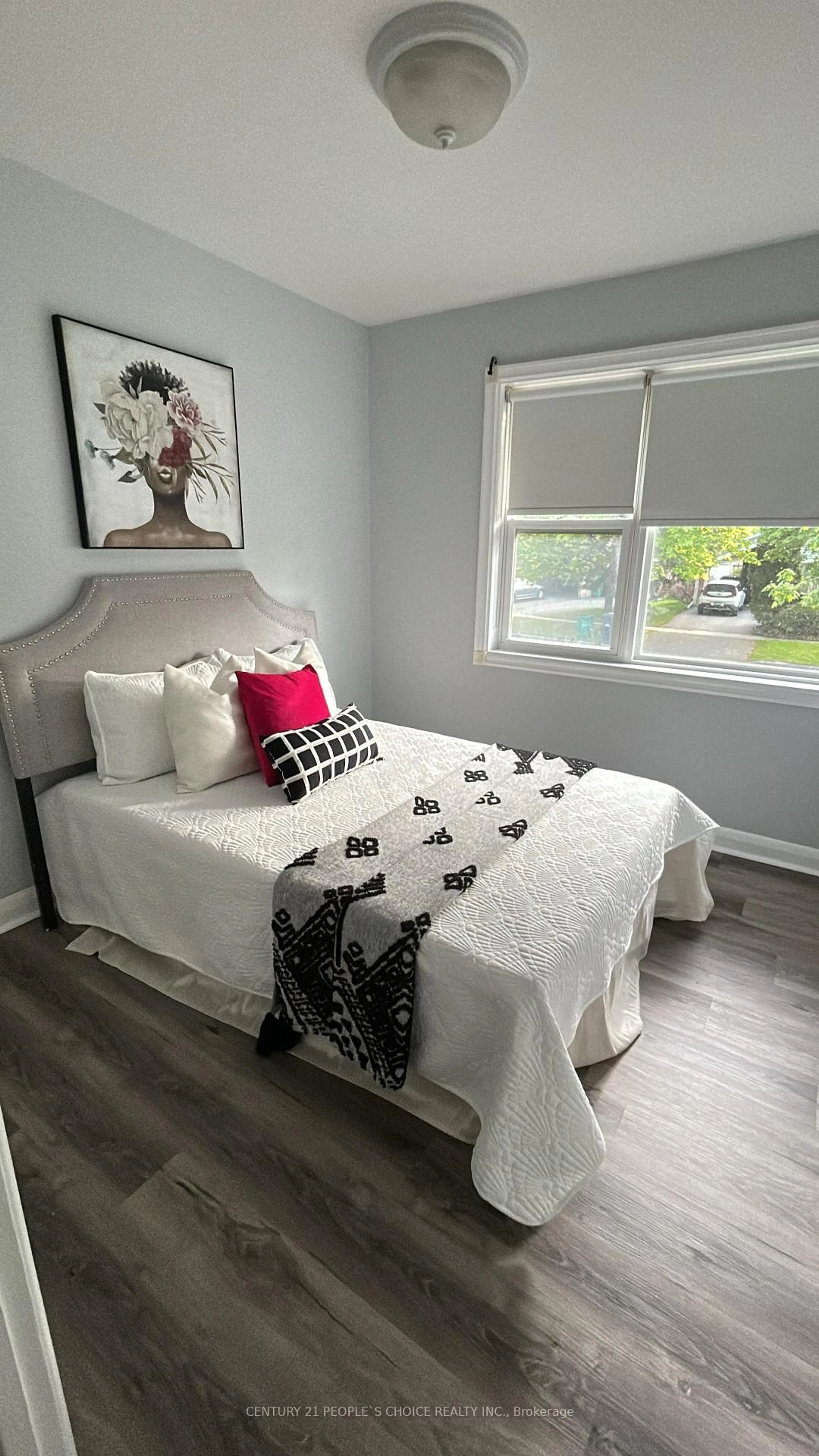 Bedroom with bed, wood/laminate floor for 39 Meadowland Dr, Brampton Ontario L6W 2R5