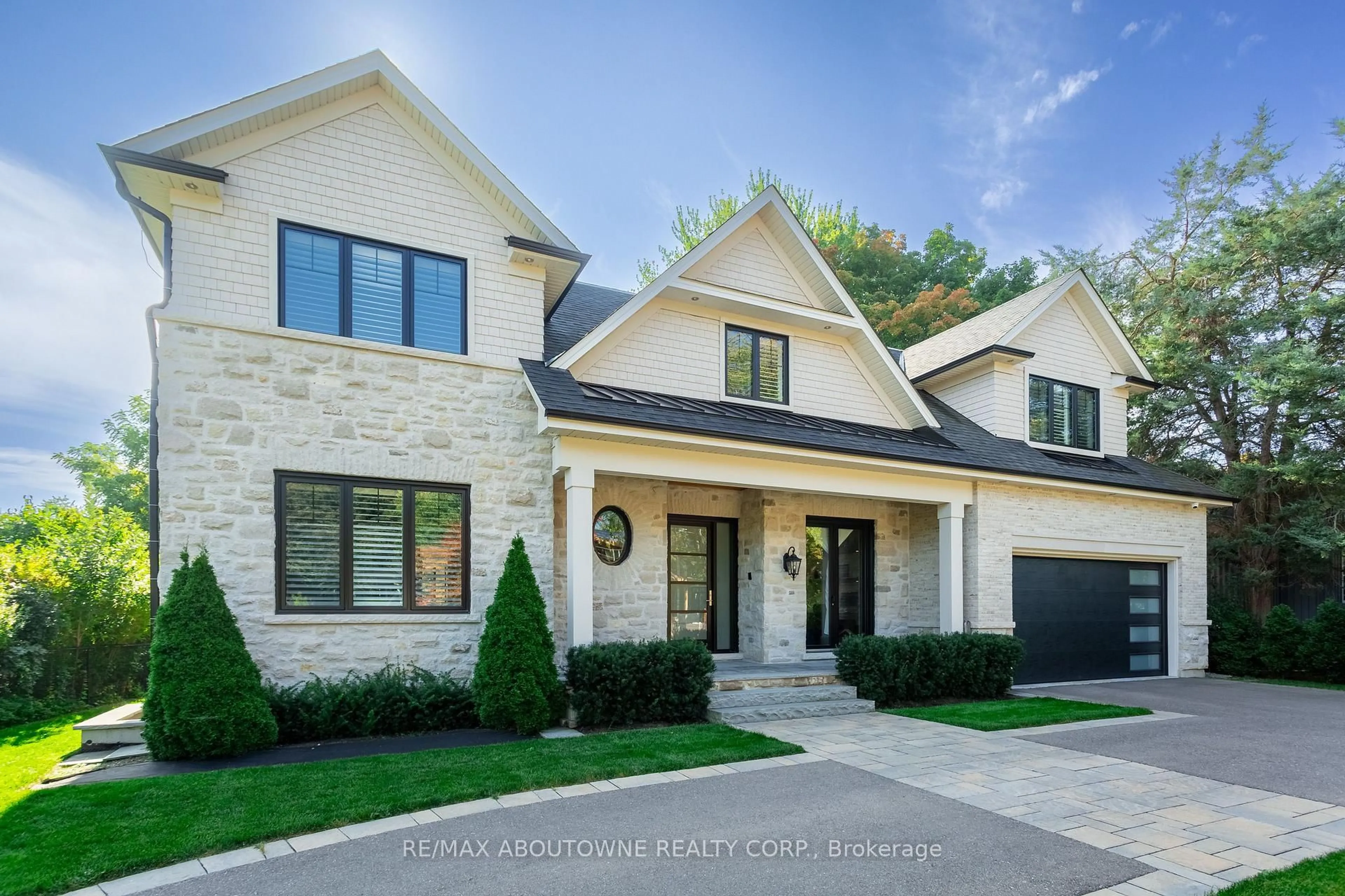 Home with brick exterior material, street for 304 Winston Rd, Oakville Ontario L6L 4W5