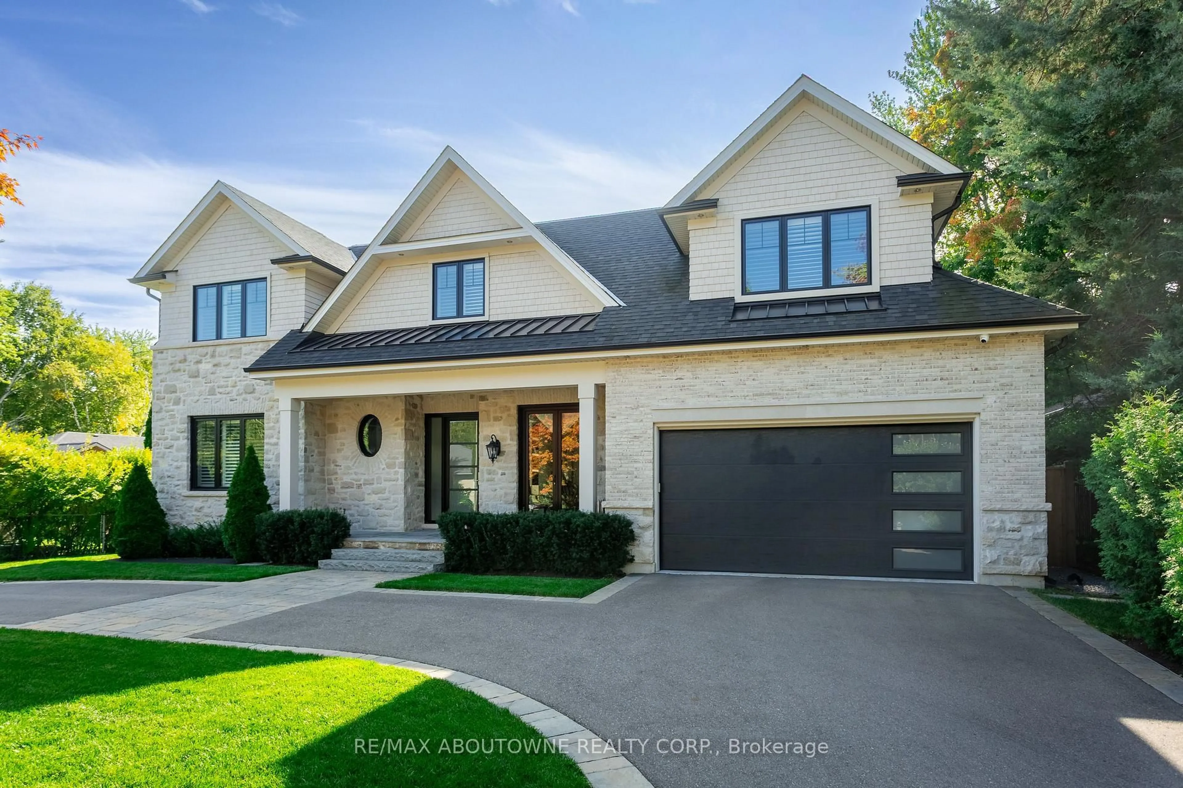 Home with brick exterior material, street for 304 Winston Rd, Oakville Ontario L6L 4W5