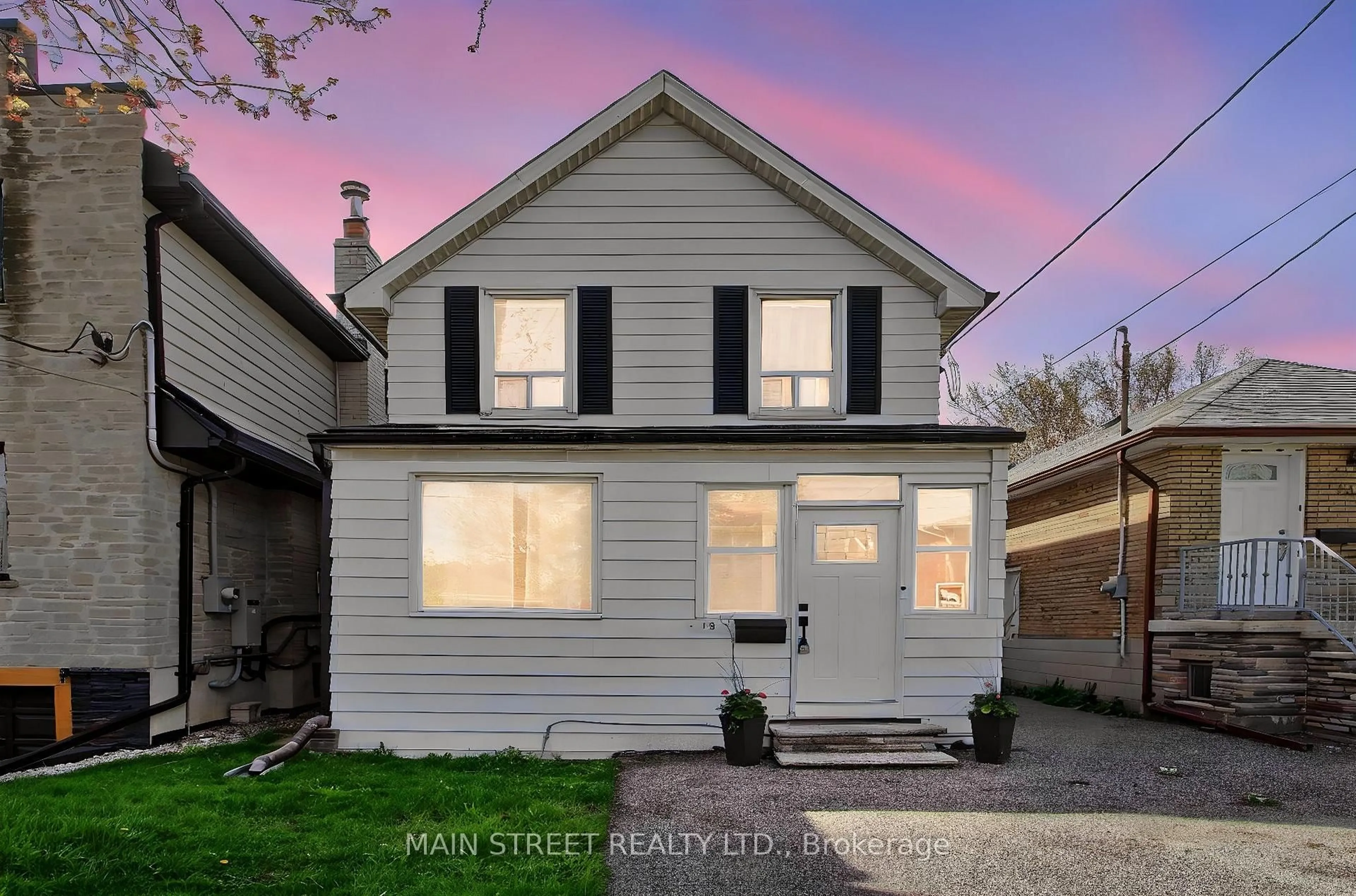 Home with vinyl exterior material, street for 19 Macdonald St, Toronto Ontario M8V 1Y3