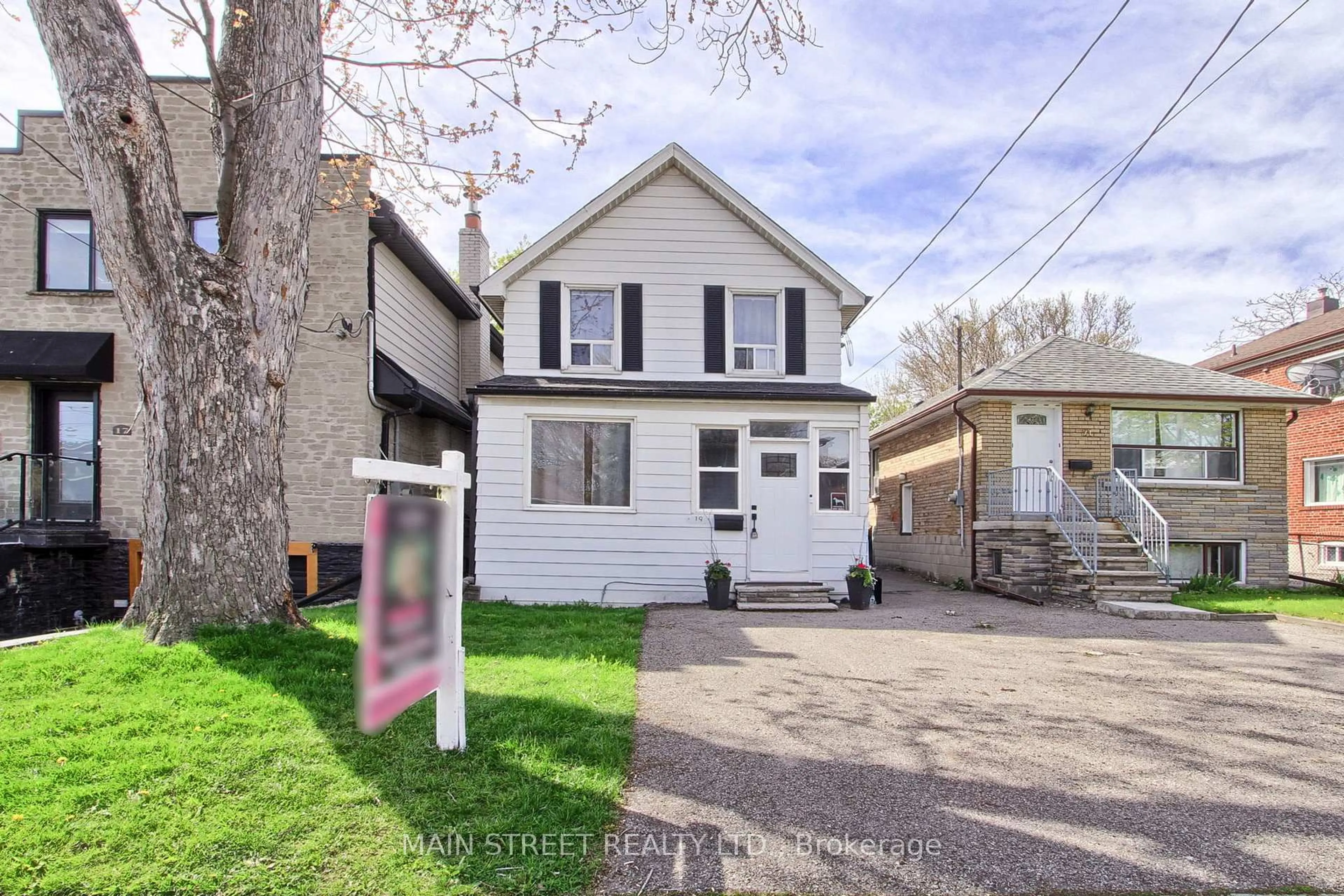 Home with vinyl exterior material, street for 19 Macdonald St, Toronto Ontario M8V 1Y3