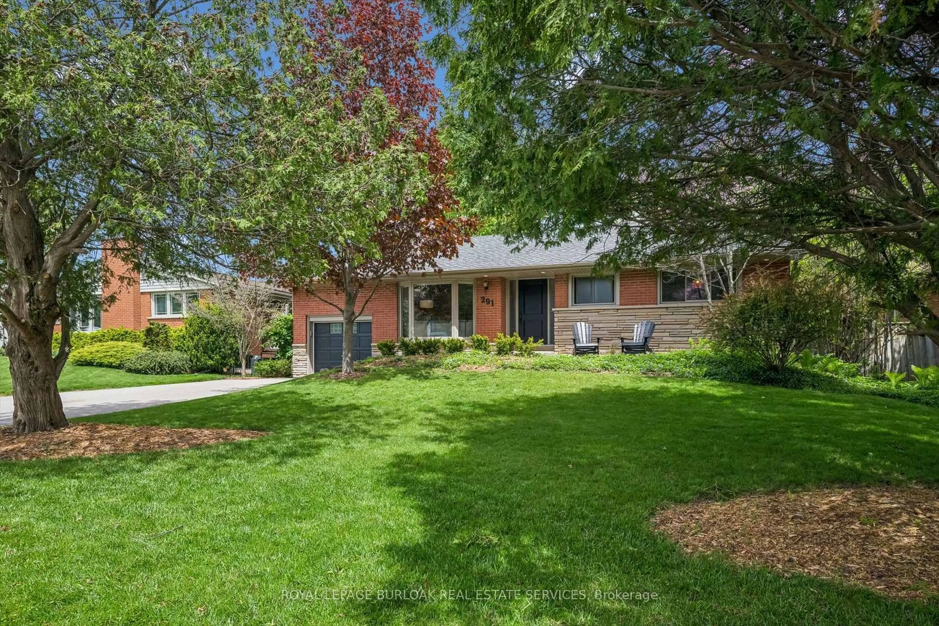 Home with brick exterior material, street for 291 Strathcona Dr, Burlington Ontario L7L 2C9