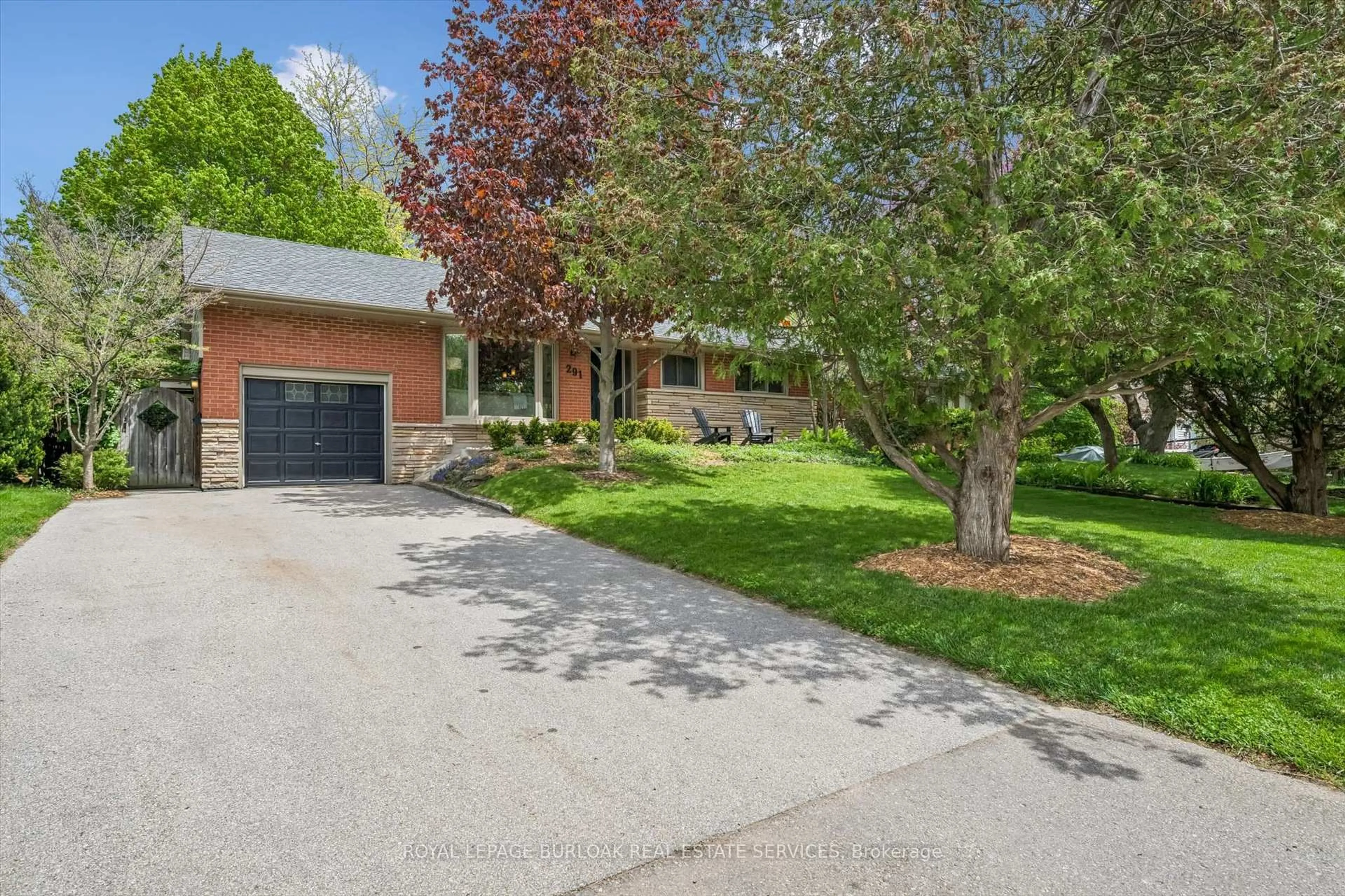 Home with brick exterior material, street for 291 Strathcona Dr, Burlington Ontario L7L 2C9