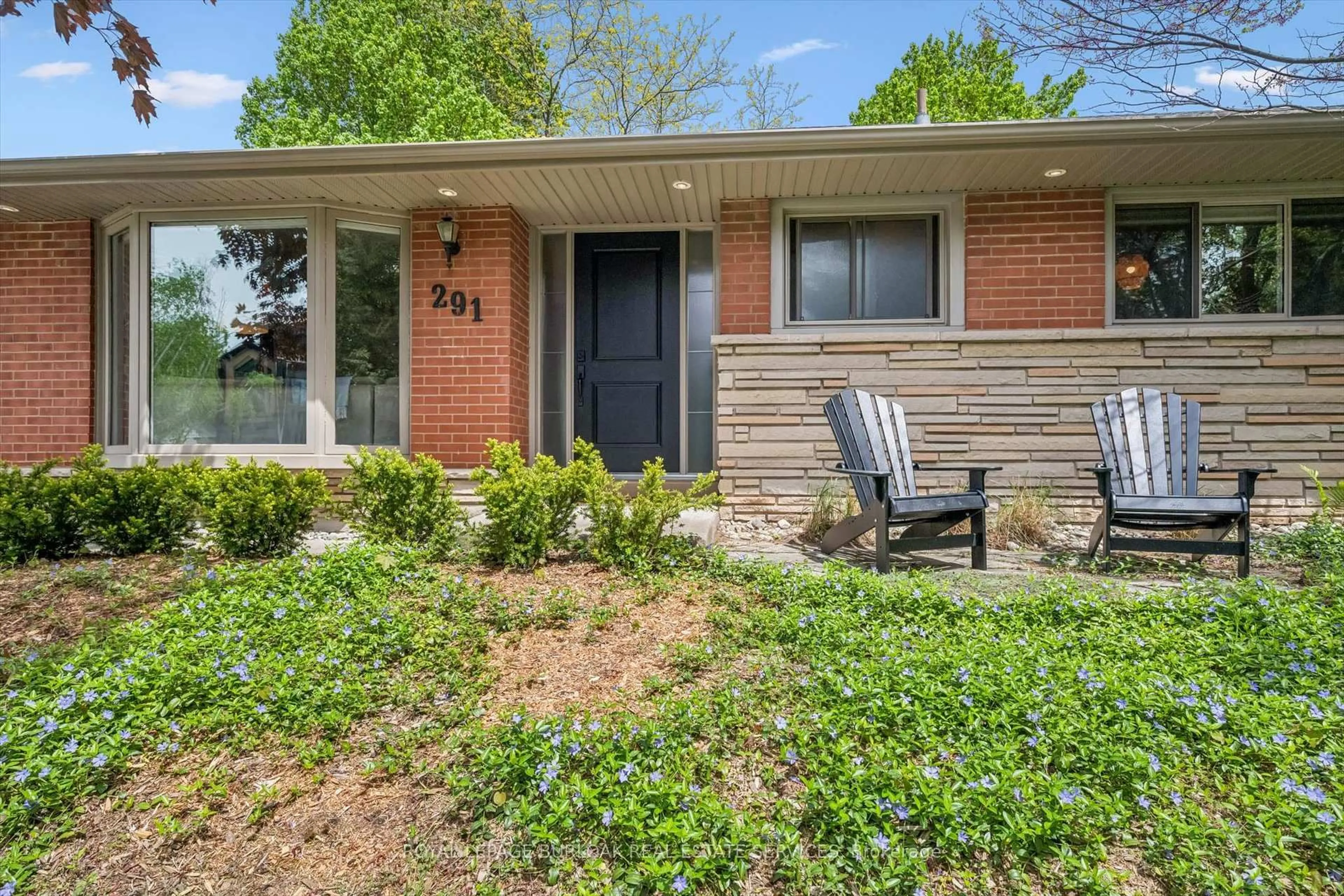 Home with brick exterior material, street for 291 Strathcona Dr, Burlington Ontario L7L 2C9