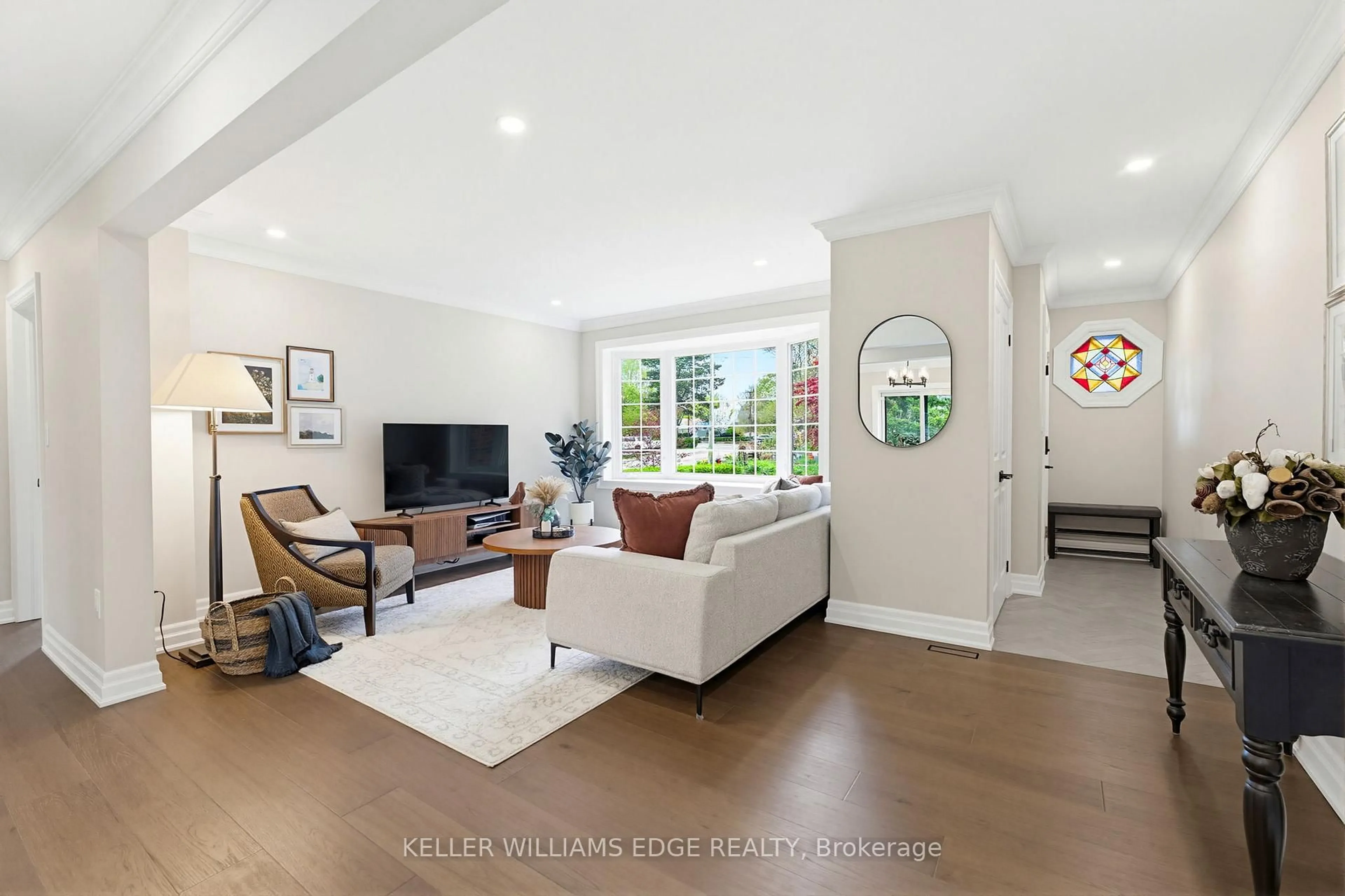 Living room with furniture, ceramic/tile floor for 586 Woodland Ave, Burlington Ontario L7R 2S5