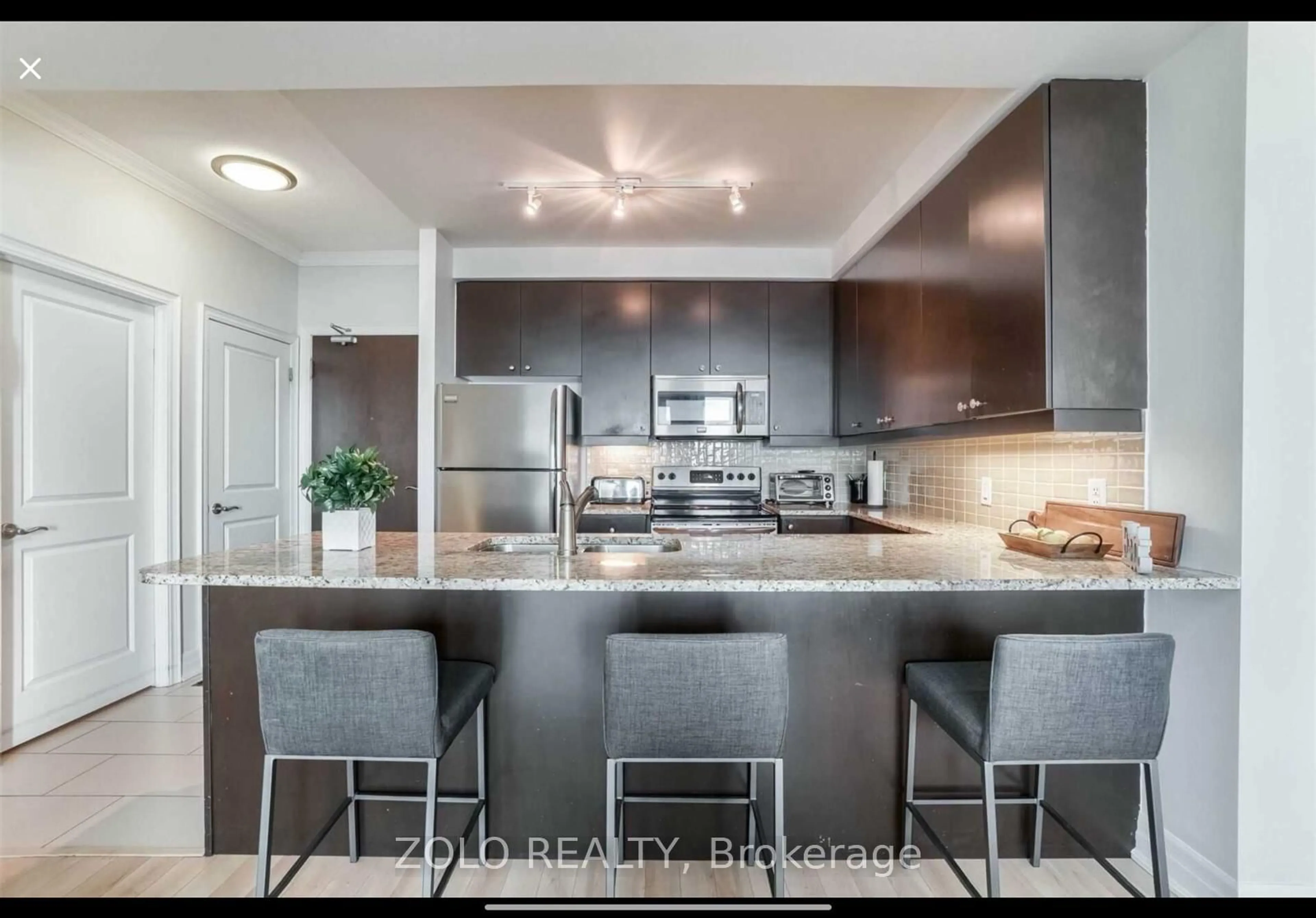 Open concept kitchen, unknown for 100 John St #1905, Brampton Ontario L6W 0A8