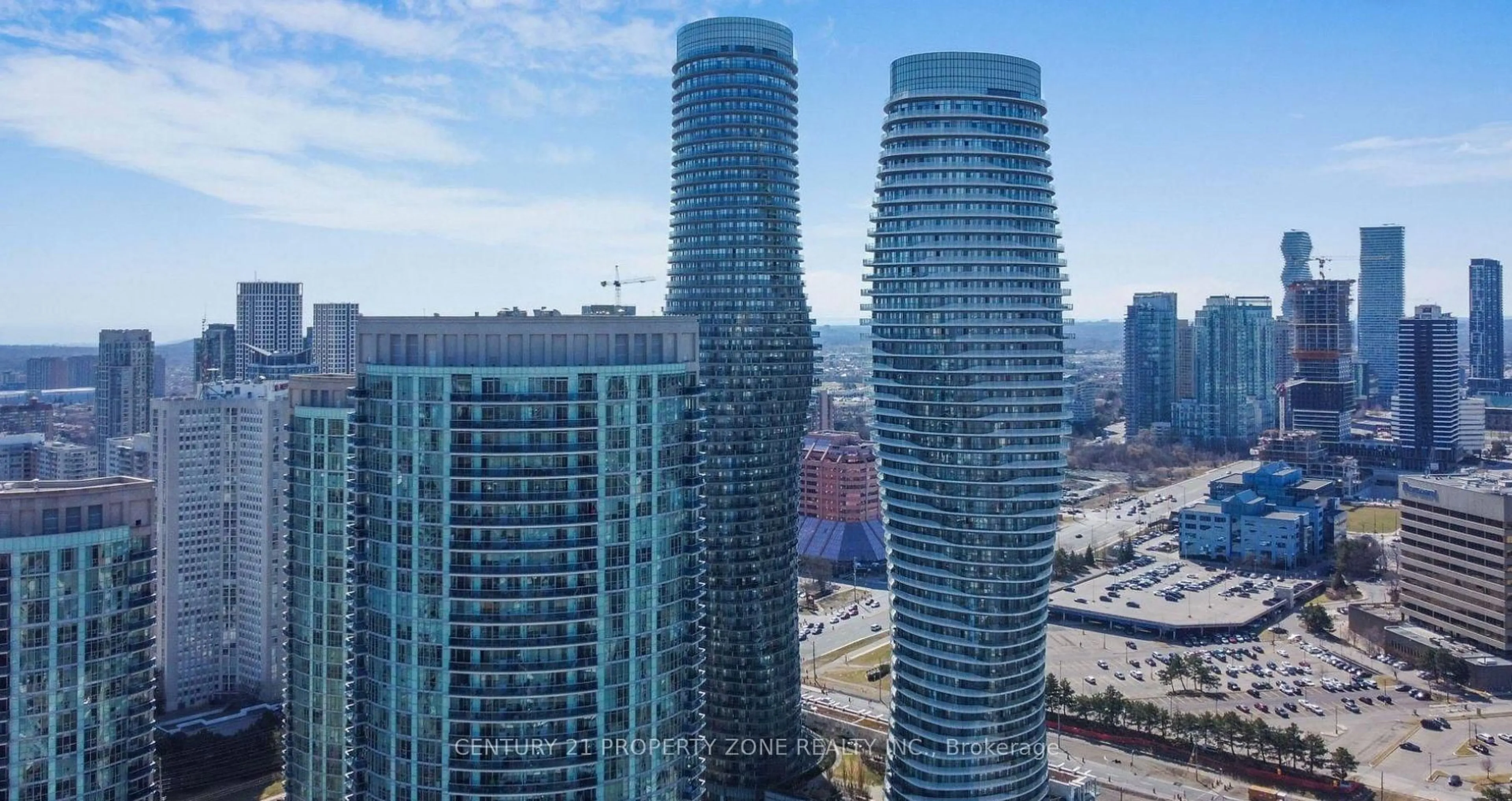 A pic from outside/outdoor area/front of a property/back of a property/a pic from drone, city buildings view from balcony for 80 Absolute Ave #3303, Mississauga Ontario L4Z 0A5