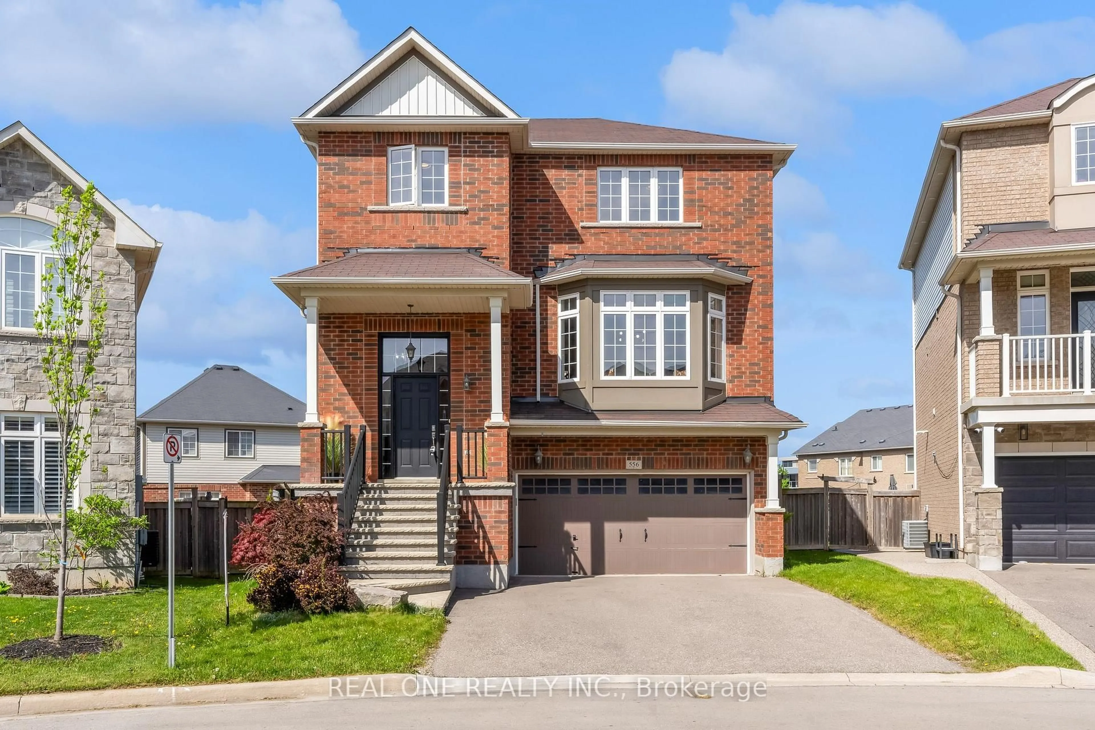 Home with brick exterior material, street for 556 Sanderson Cres, Milton Ontario L9T 8L9