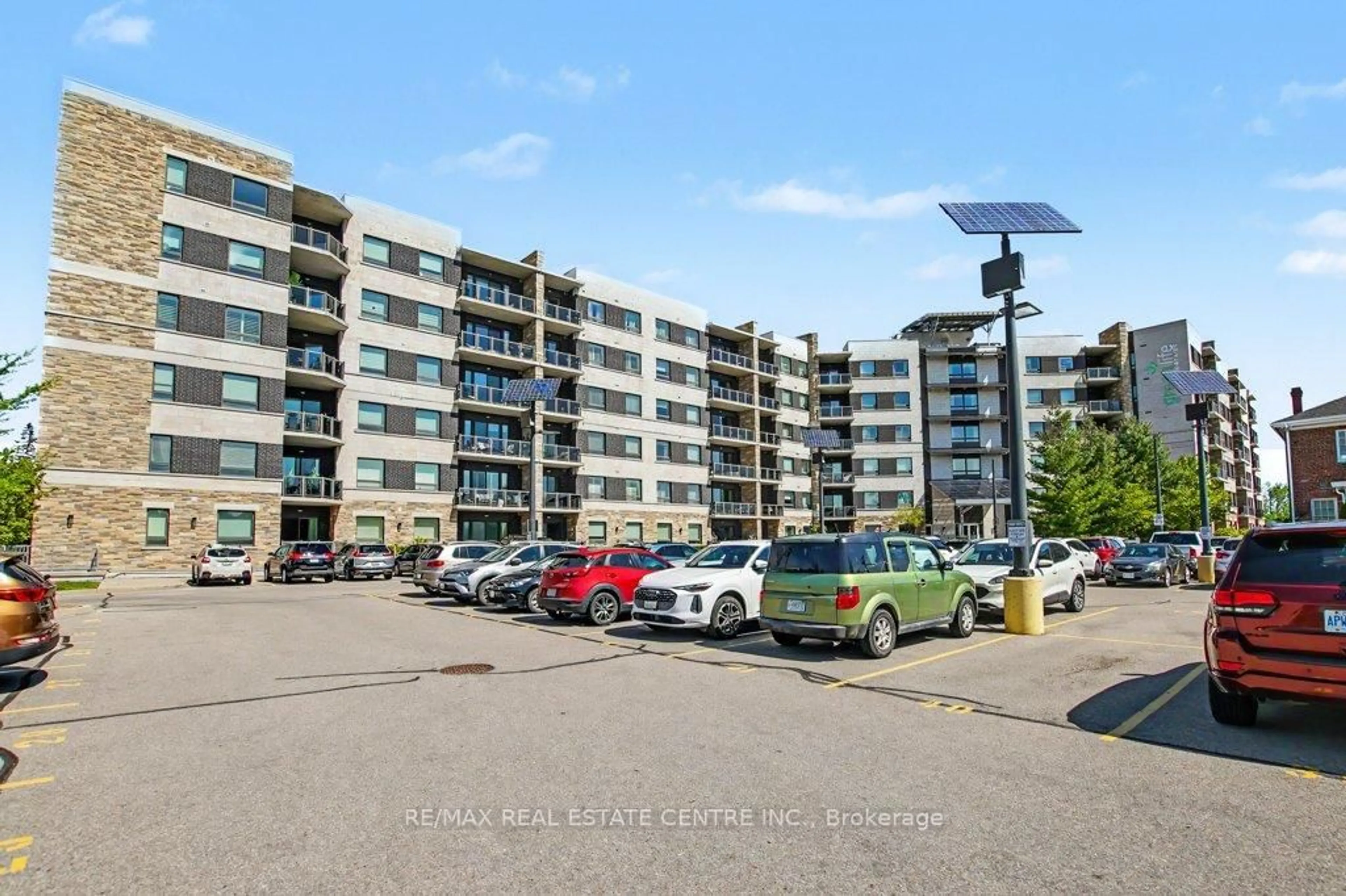 A pic from outside/outdoor area/front of a property/back of a property/a pic from drone, street for 33 Whitmer St #214, Milton Ontario L9T 8P9