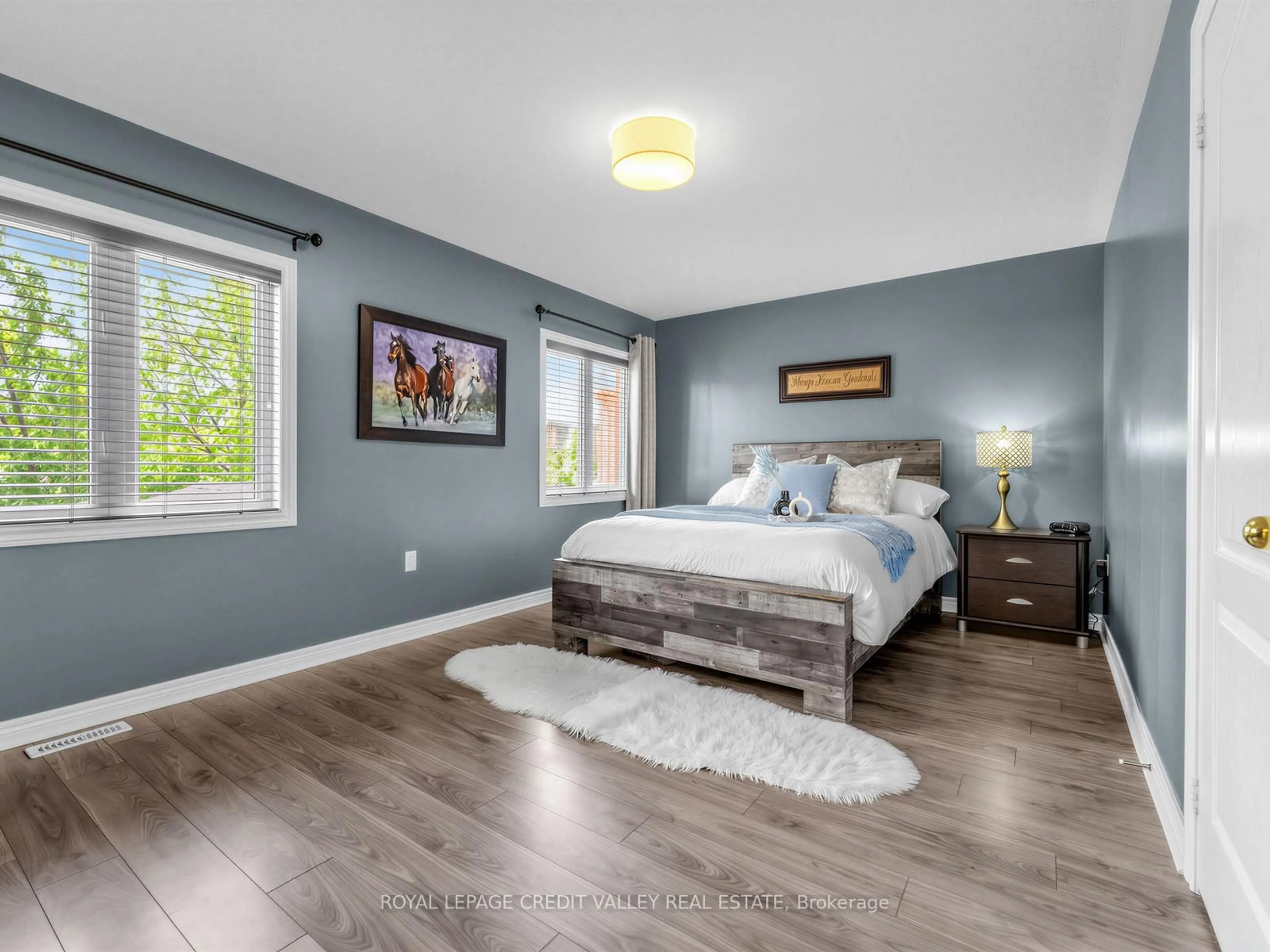 Bedroom with bed, wood/laminate floor for 144 Mccready Dr, Milton Ontario L9T 0V5