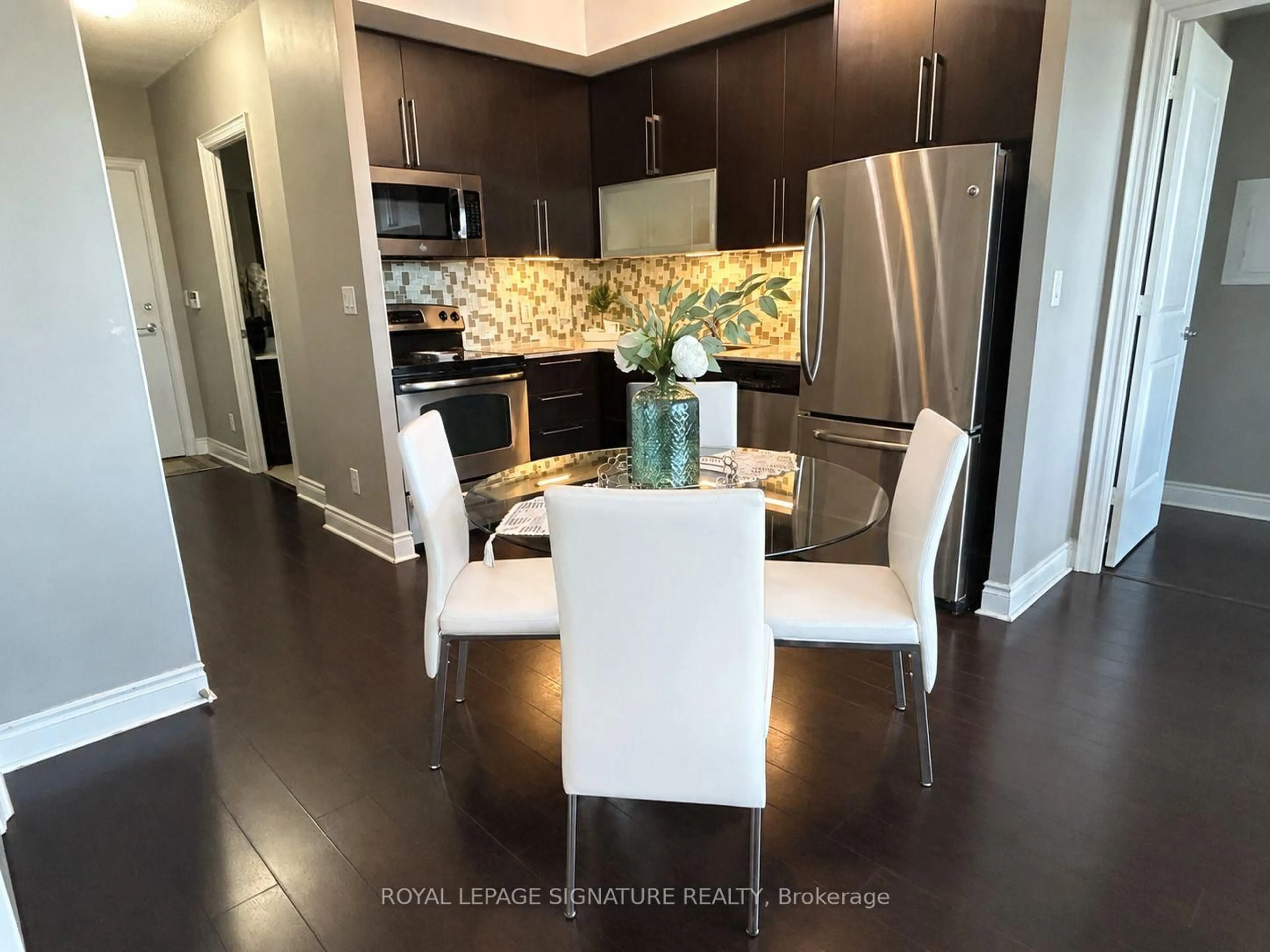 Open concept kitchen, wood/laminate floor for 16 Brookers Lane #2704, Toronto Ontario M8V 0A5