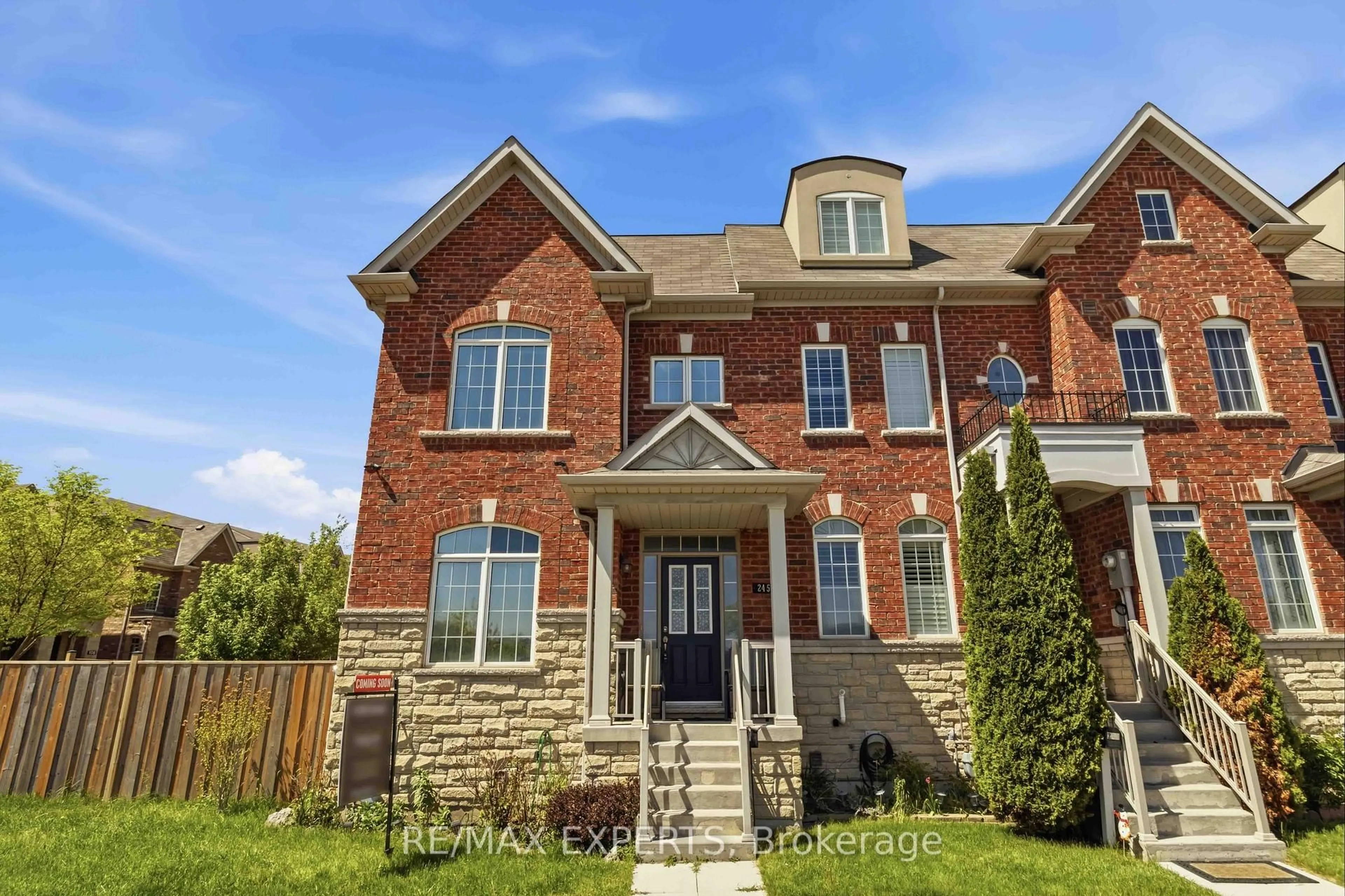 Home with brick exterior material, street for 245 Isaac Devins Blvd, Toronto Ontario M9M 0B6