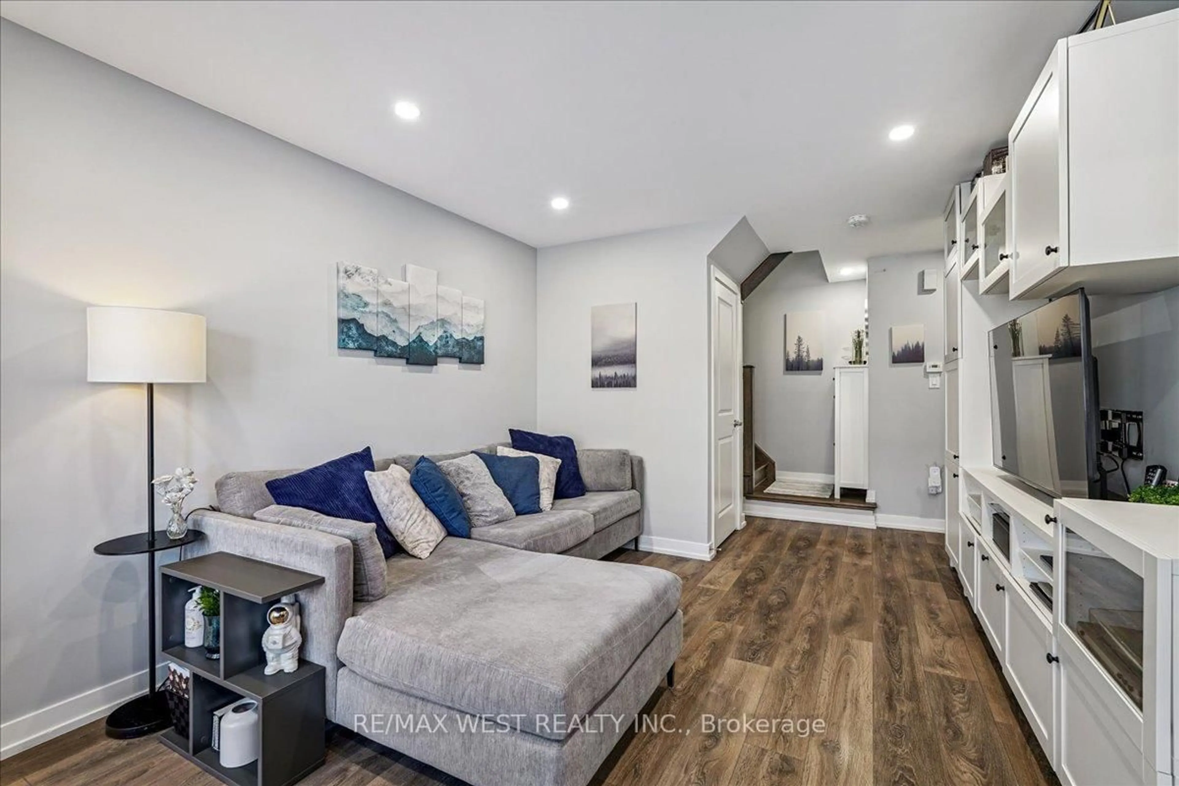 Living room with furniture, unknown for 80 Parrotta Dr #148, Toronto Ontario M9M 0E6