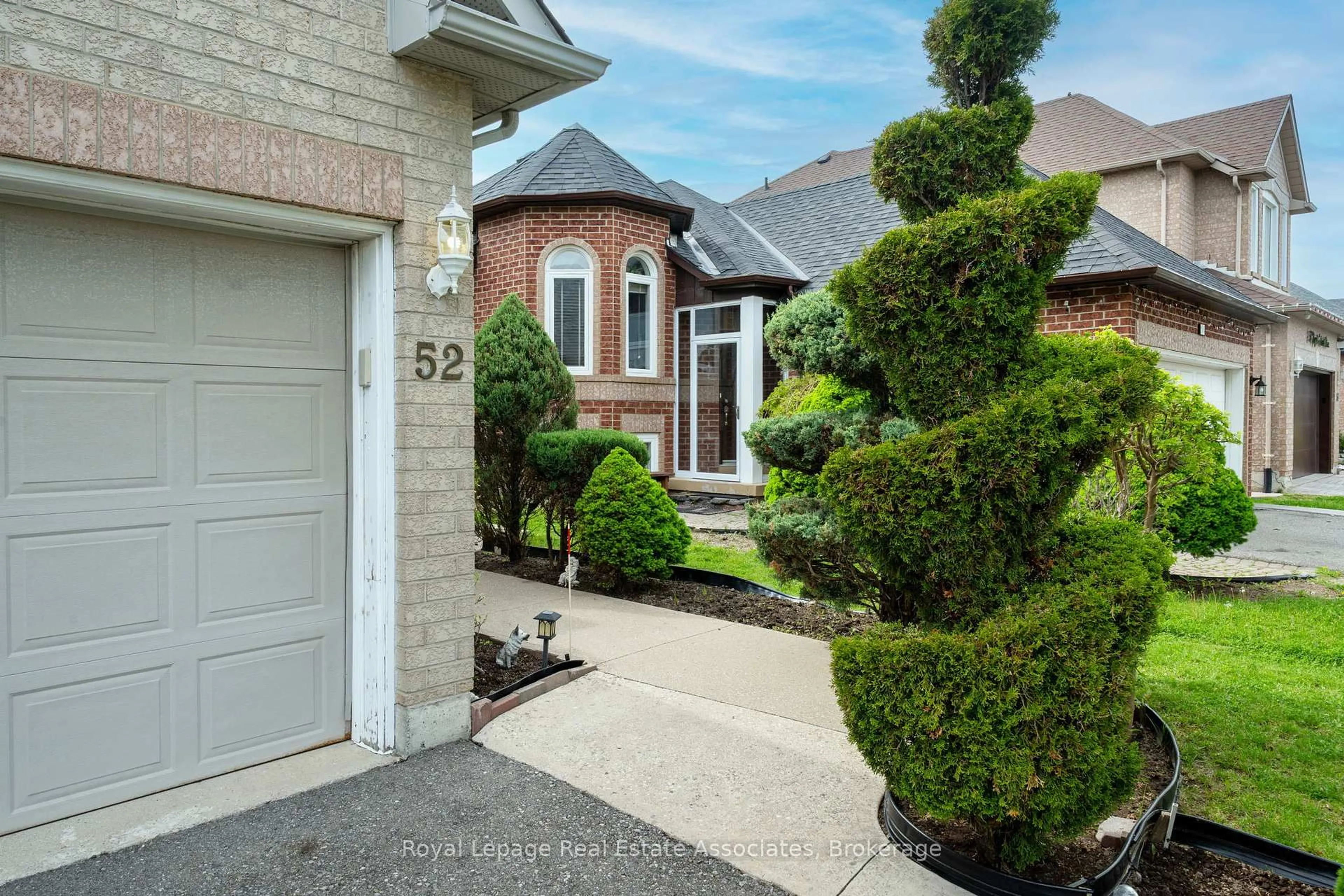 Home with brick exterior material, street for 52 Royal Orchard Dr, Brampton Ontario L6X 4M4