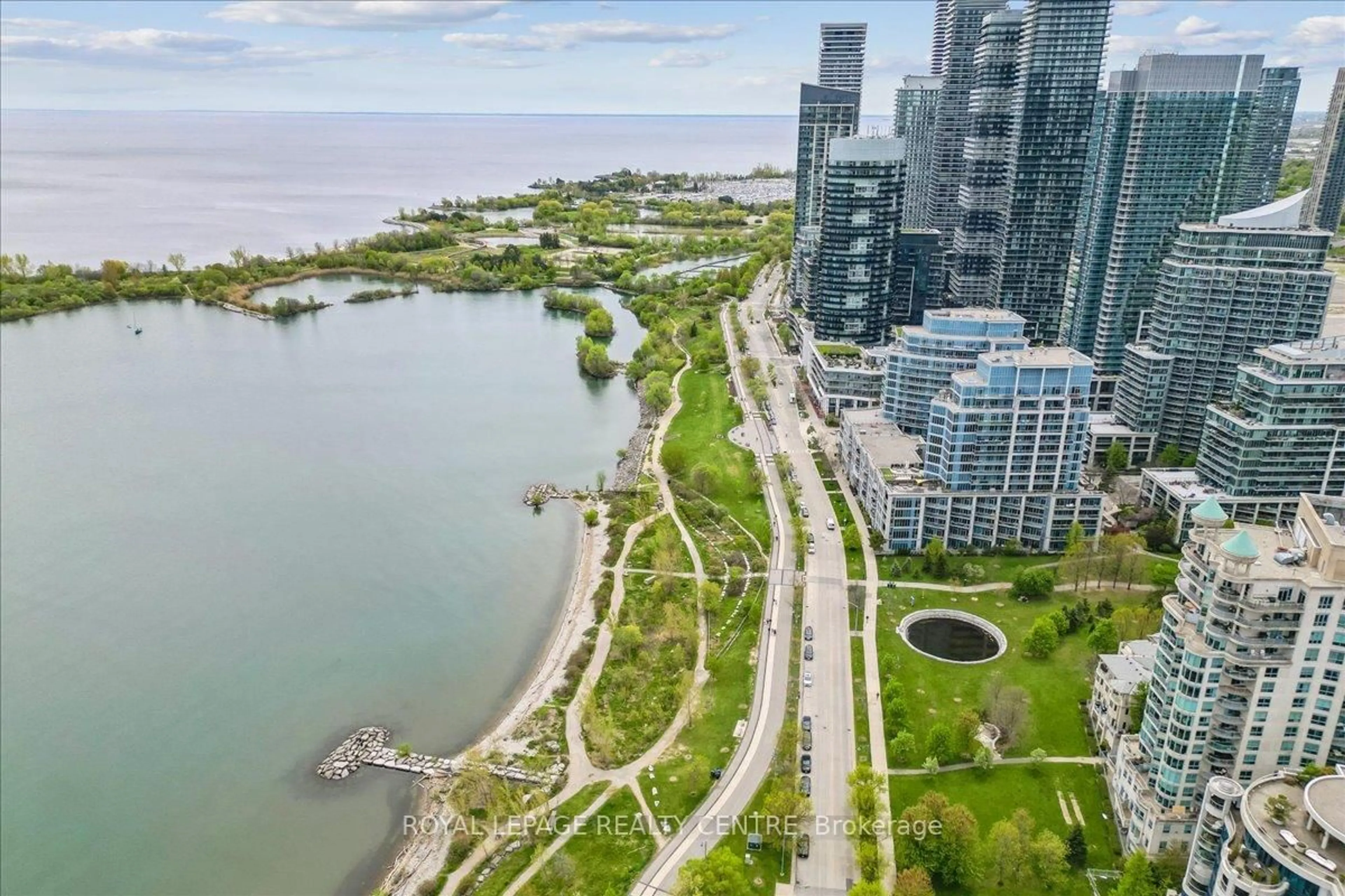 A pic from outside/outdoor area/front of a property/back of a property/a pic from drone, water/lake/river/ocean view for 2095 Lake Shore Blvd #318, Toronto Ontario M8V 4G4