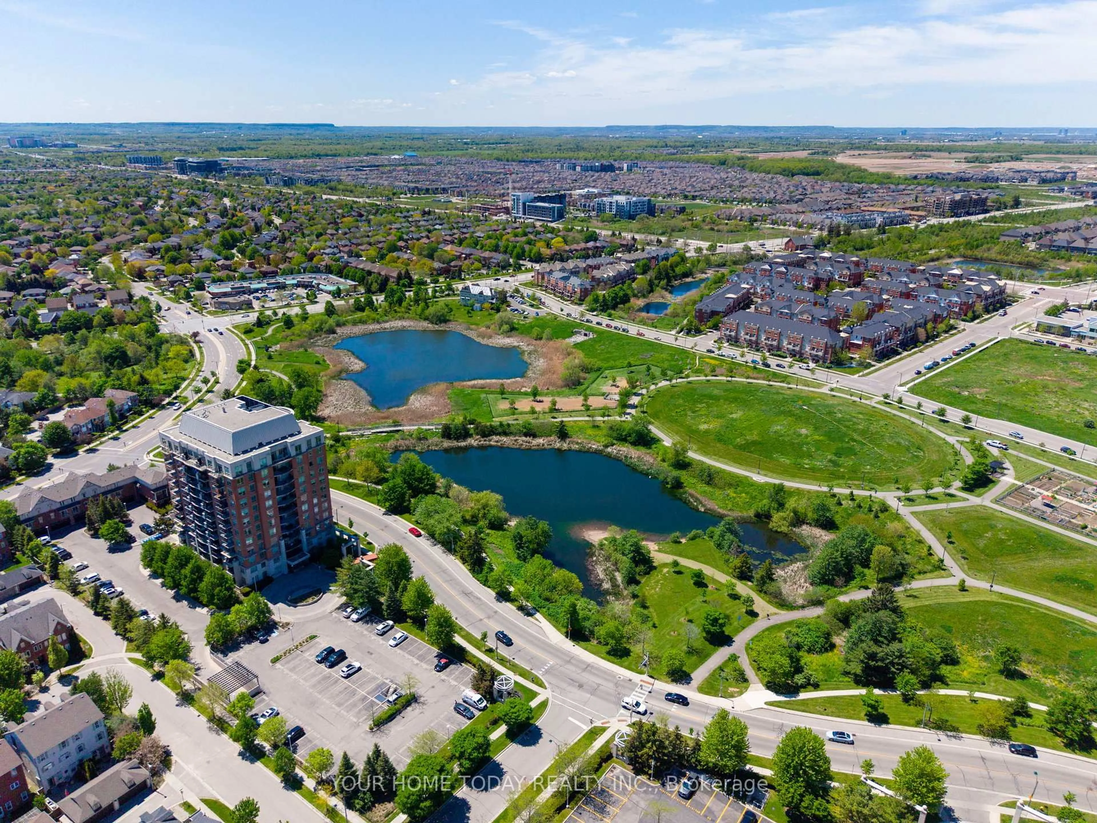 A pic from outside/outdoor area/front of a property/back of a property/a pic from drone, water/lake/river/ocean view for 2325 Central Park Dr #705, Oakville Ontario L6H 0E2