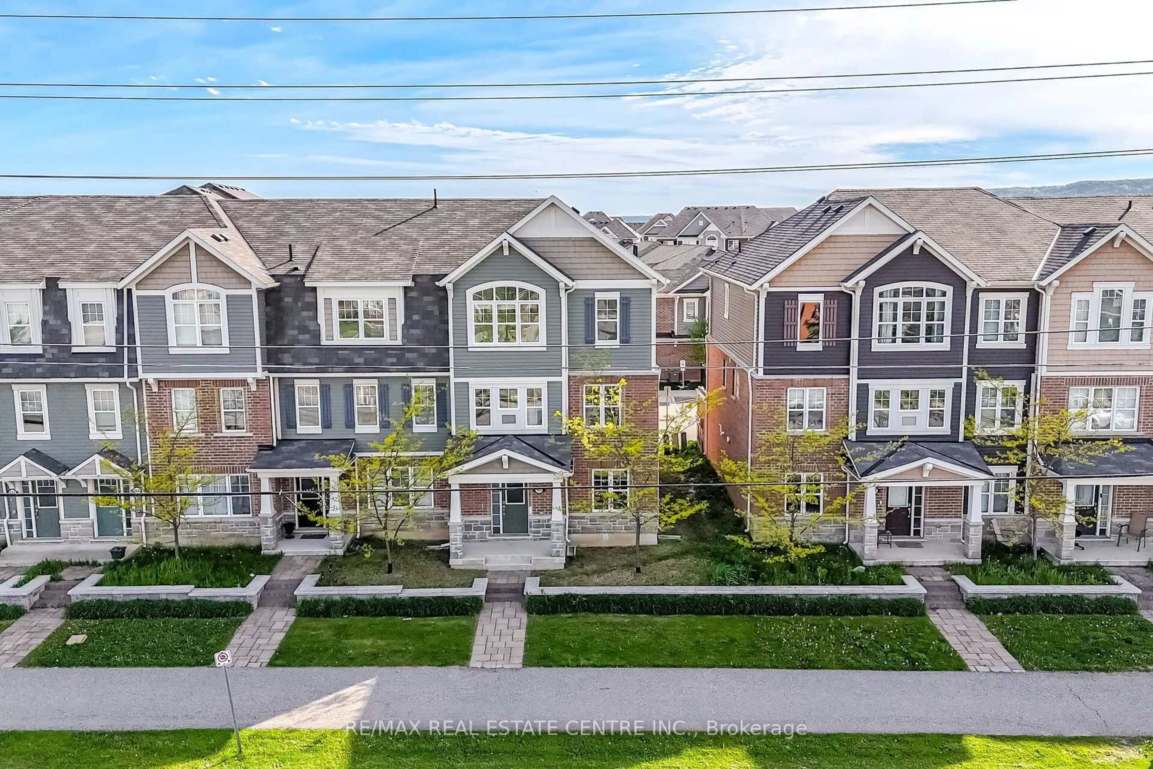 A pic from outside/outdoor area/front of a property/back of a property/a pic from drone, street for 1000 Asleton Blvd #165, Milton Ontario L9T 9L3