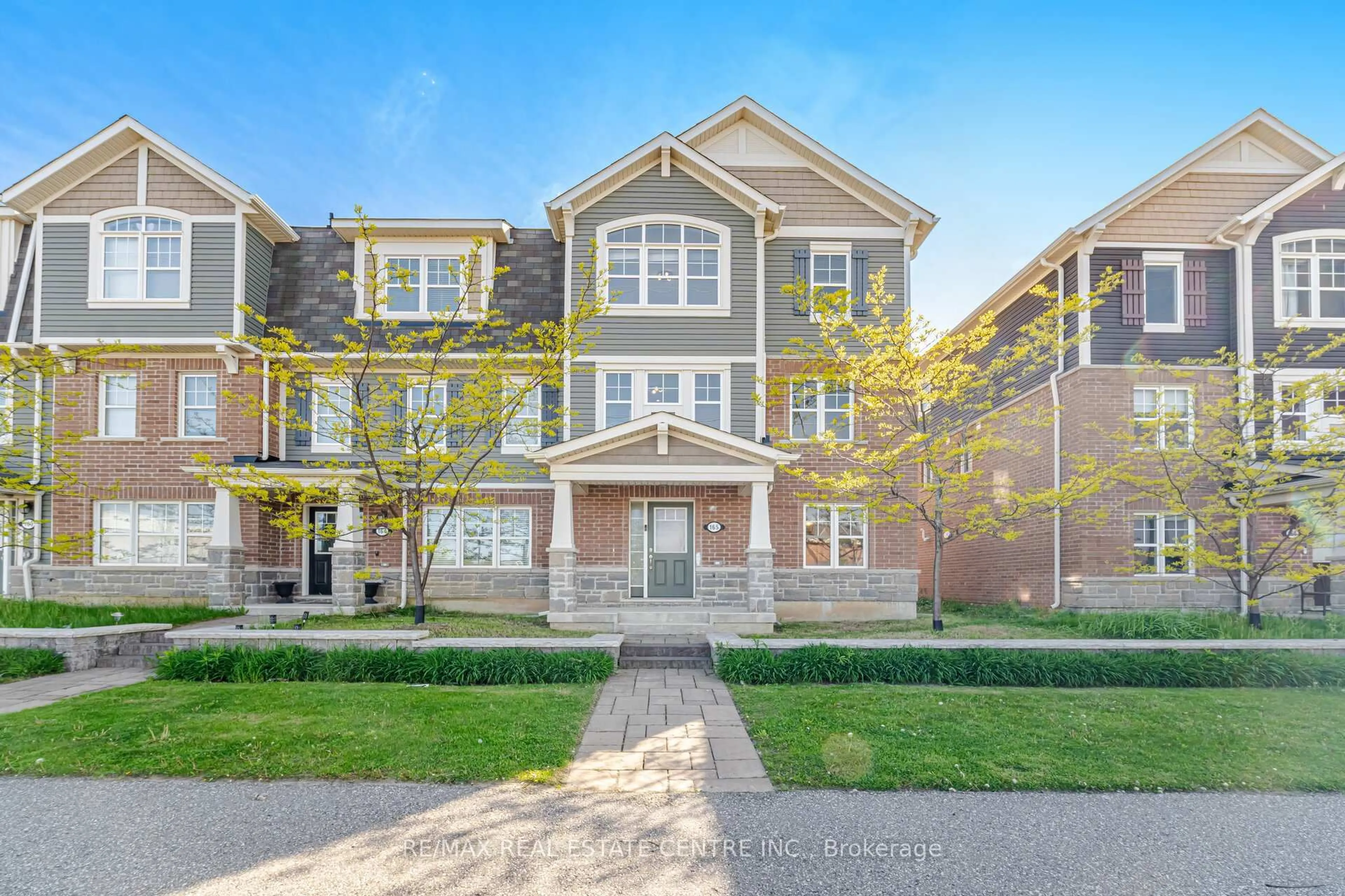 Home with brick exterior material, street for 1000 Asleton Blvd #165, Milton Ontario L9T 9L3