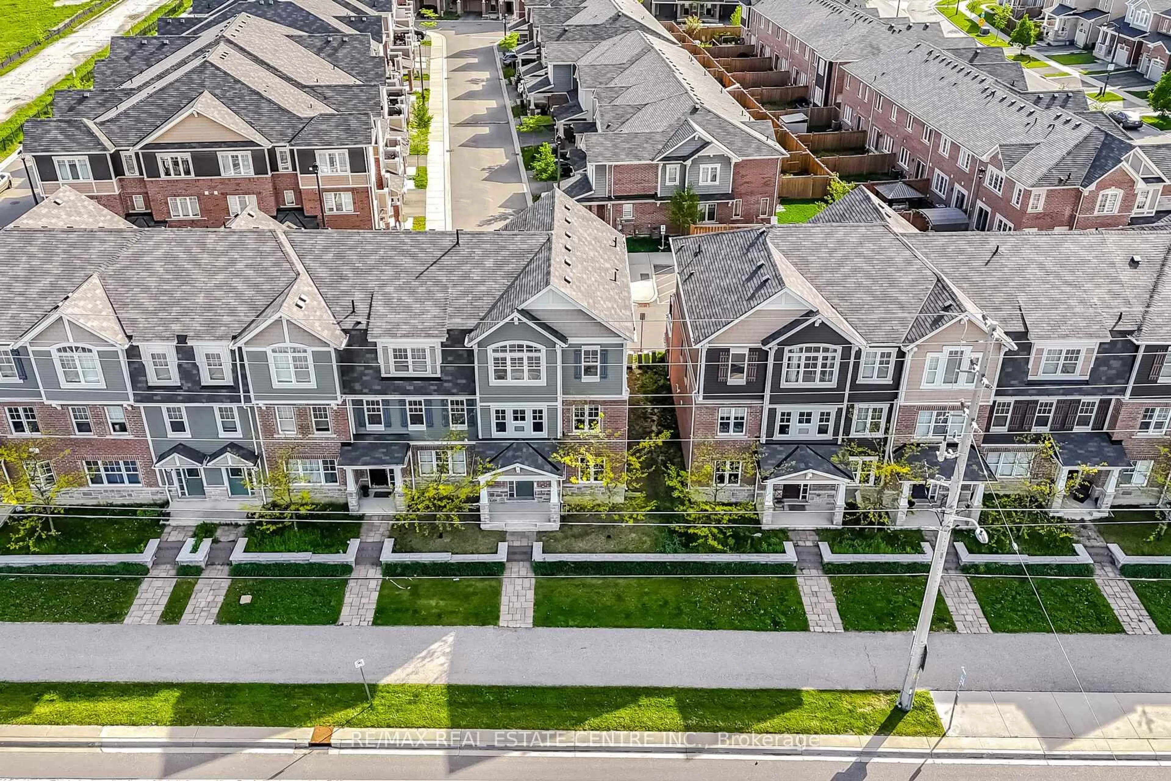 A pic from outside/outdoor area/front of a property/back of a property/a pic from drone, street for 1000 Asleton Blvd #165, Milton Ontario L9T 9L3