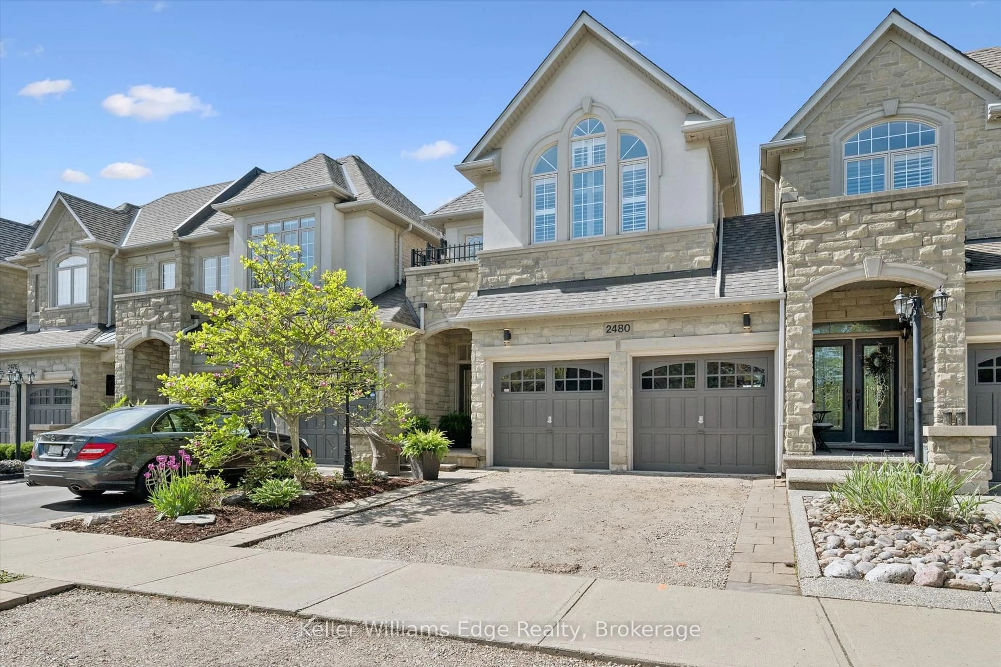 Home with brick exterior material, street for 2480 Springforest Dr, Oakville Ontario L6M 0A2
