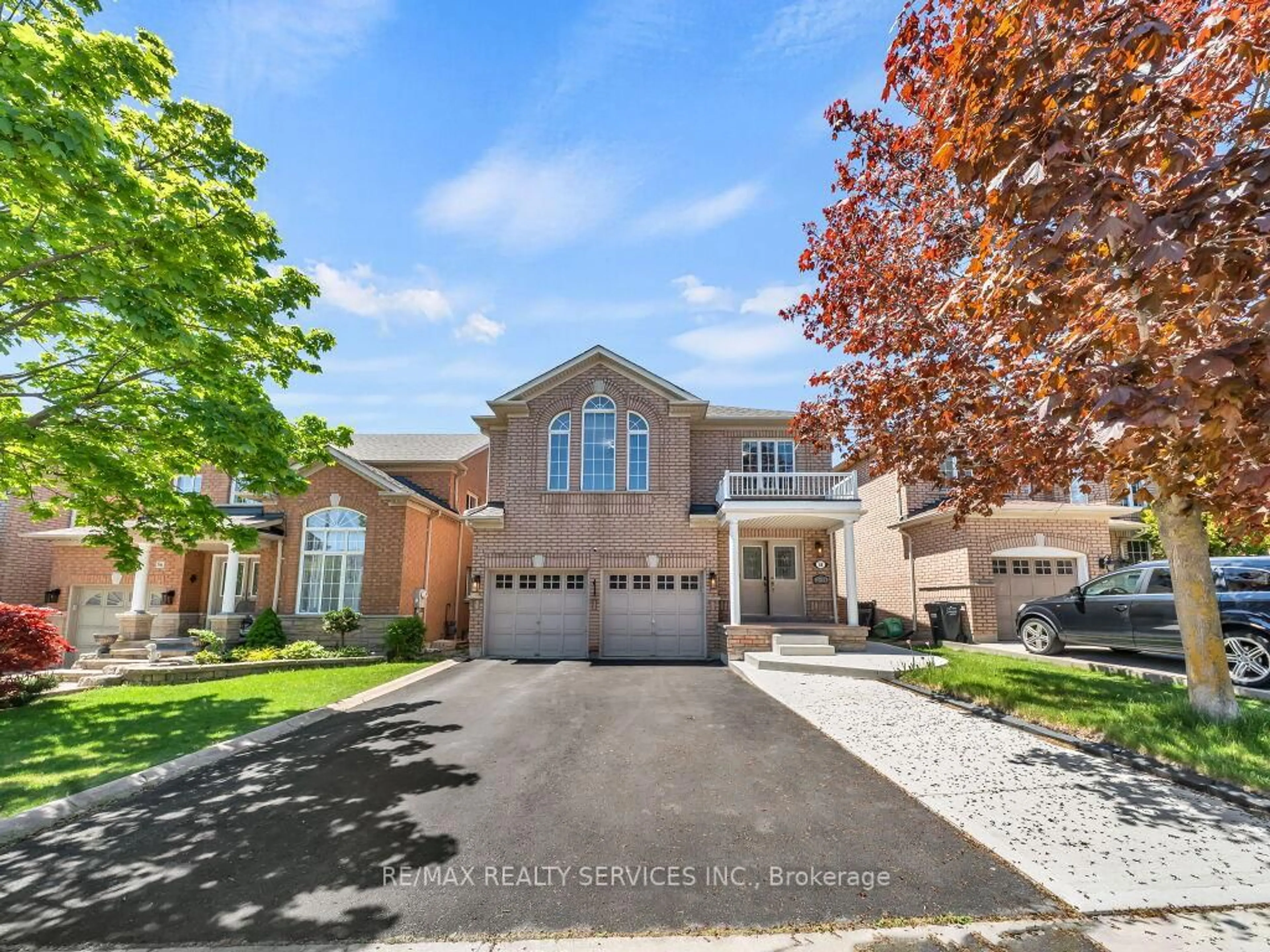Home with brick exterior material, street for 58 Queen Mary Dr, Brampton Ontario L7A 2K3