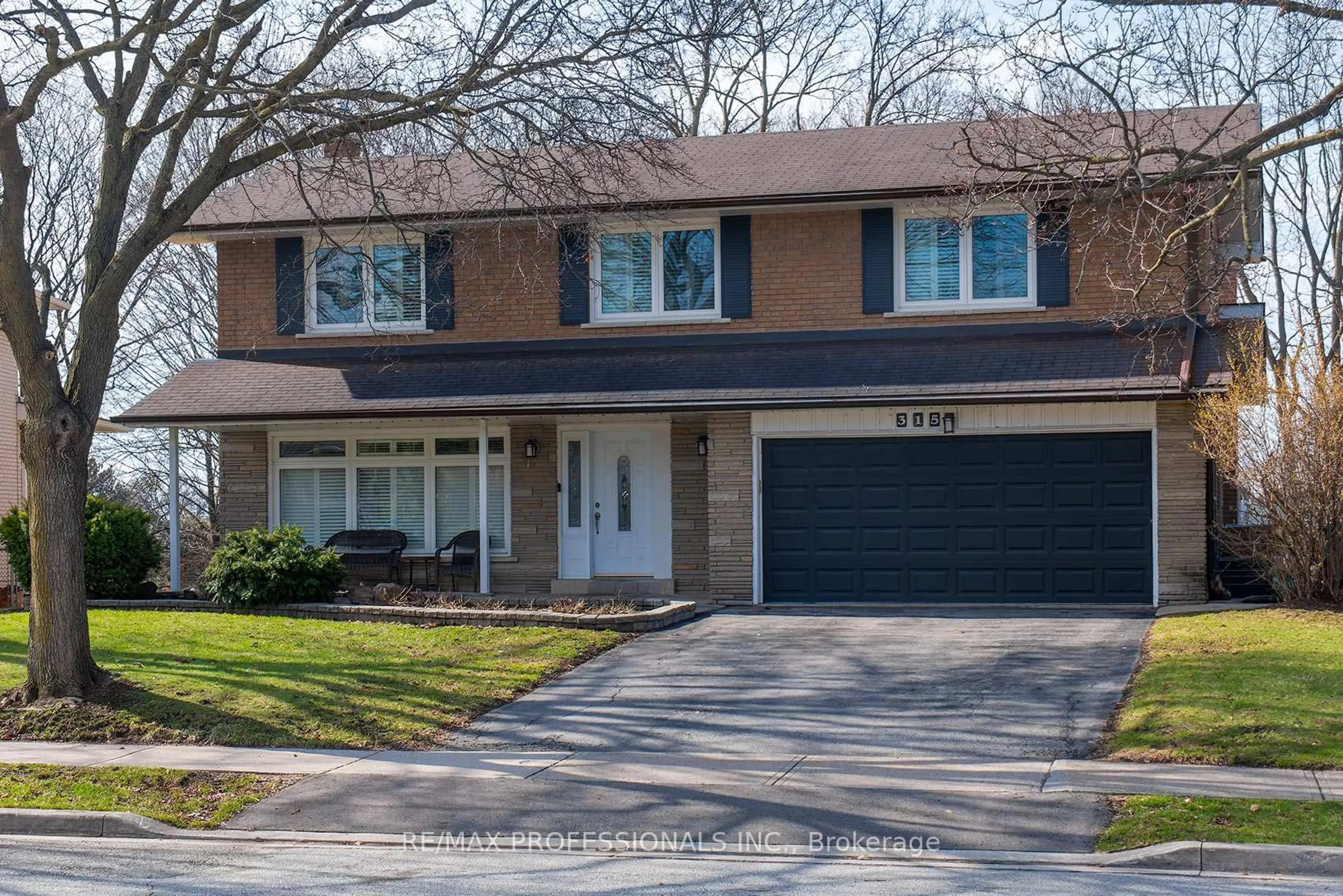 Home with brick exterior material, street for 315 Markland Dr, Toronto Ontario M9C 1R4