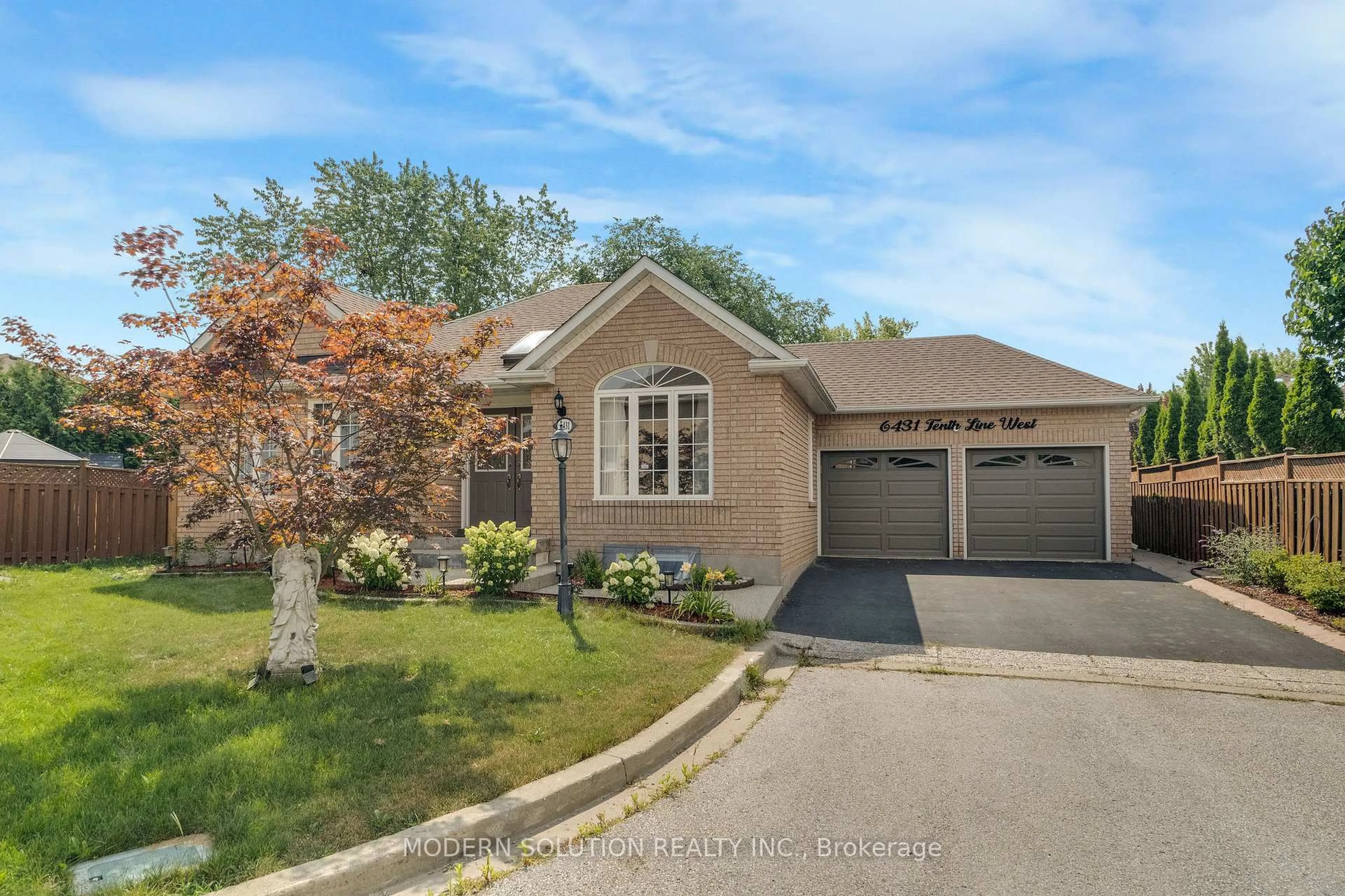 Home with brick exterior material, street for 6431 Tenth Line, Mississauga Ontario L5N 7J5