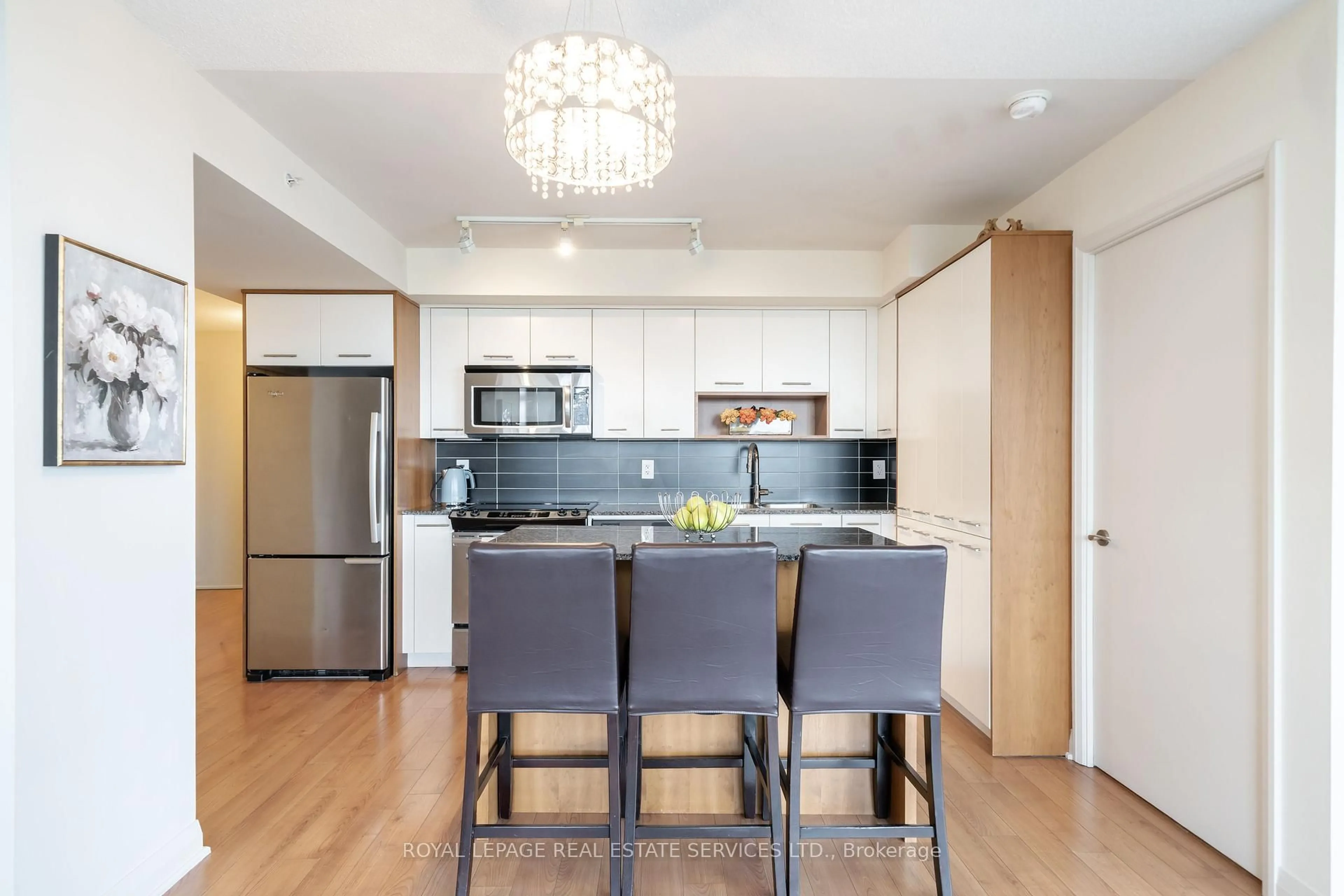 Open concept kitchen, wood/laminate floor for 1 Valhalla Inn Rd #607, Toronto Ontario M9B 1S9