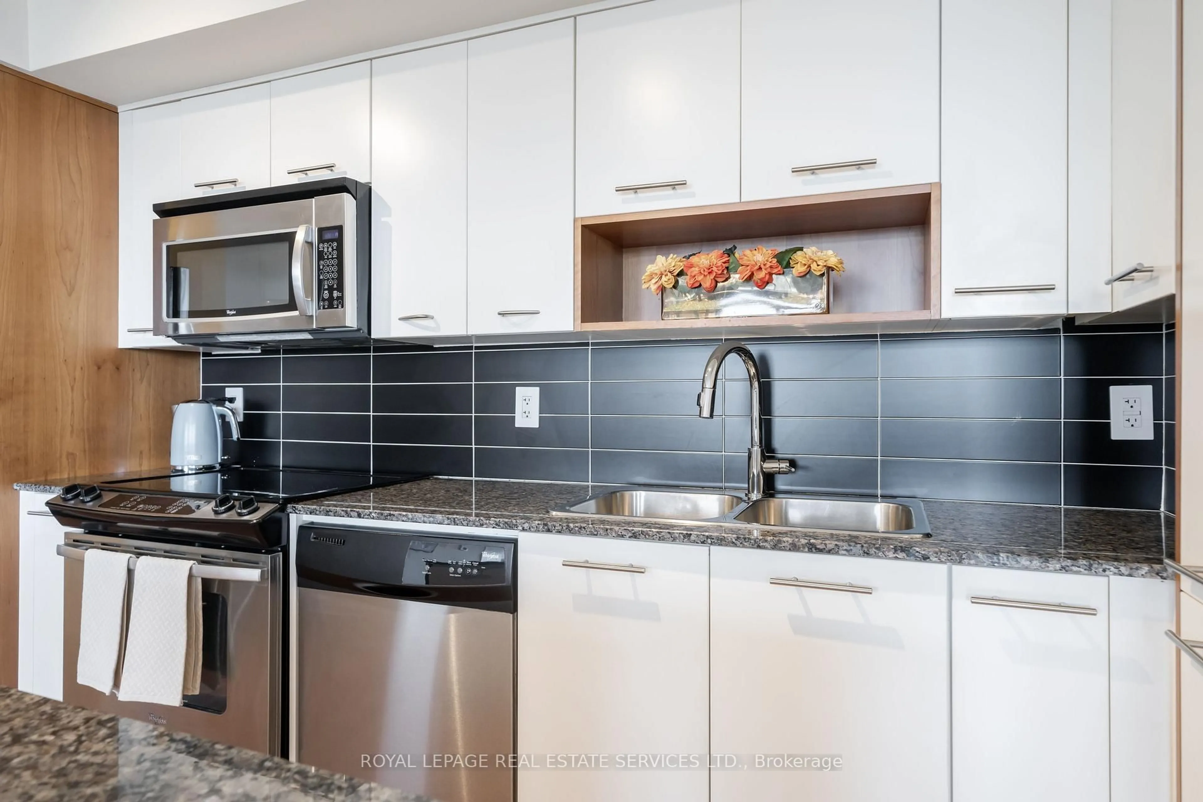 Open concept kitchen, ceramic/tile floor for 1 Valhalla Inn Rd #607, Toronto Ontario M9B 1S9