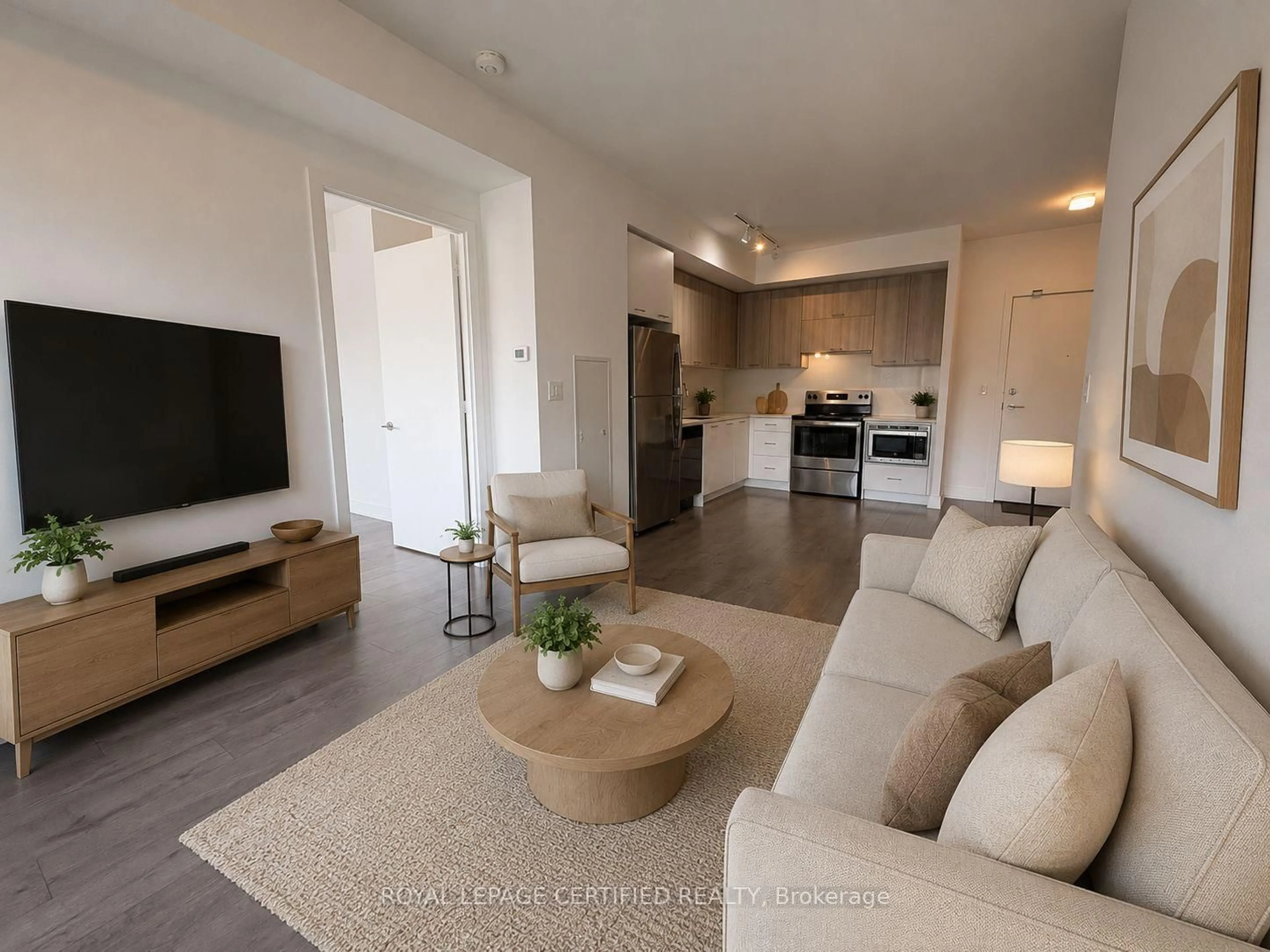 Living room with furniture, unknown for 180 Veterans Dr #307, Brampton Ontario L7A 5G7