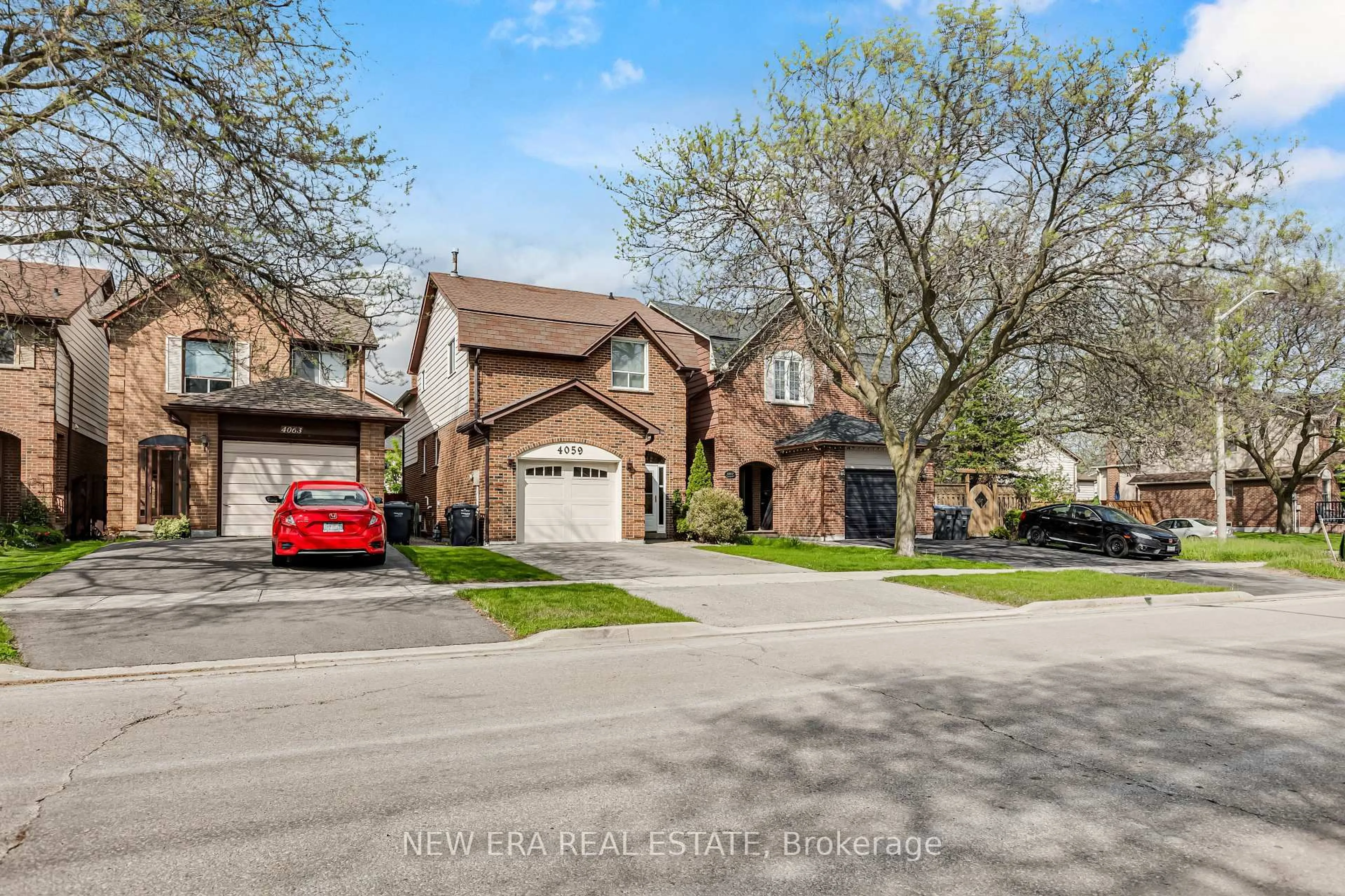 Home with brick exterior material, street for 4059 Teakwood Dr, Mississauga Ontario L5C 3L3