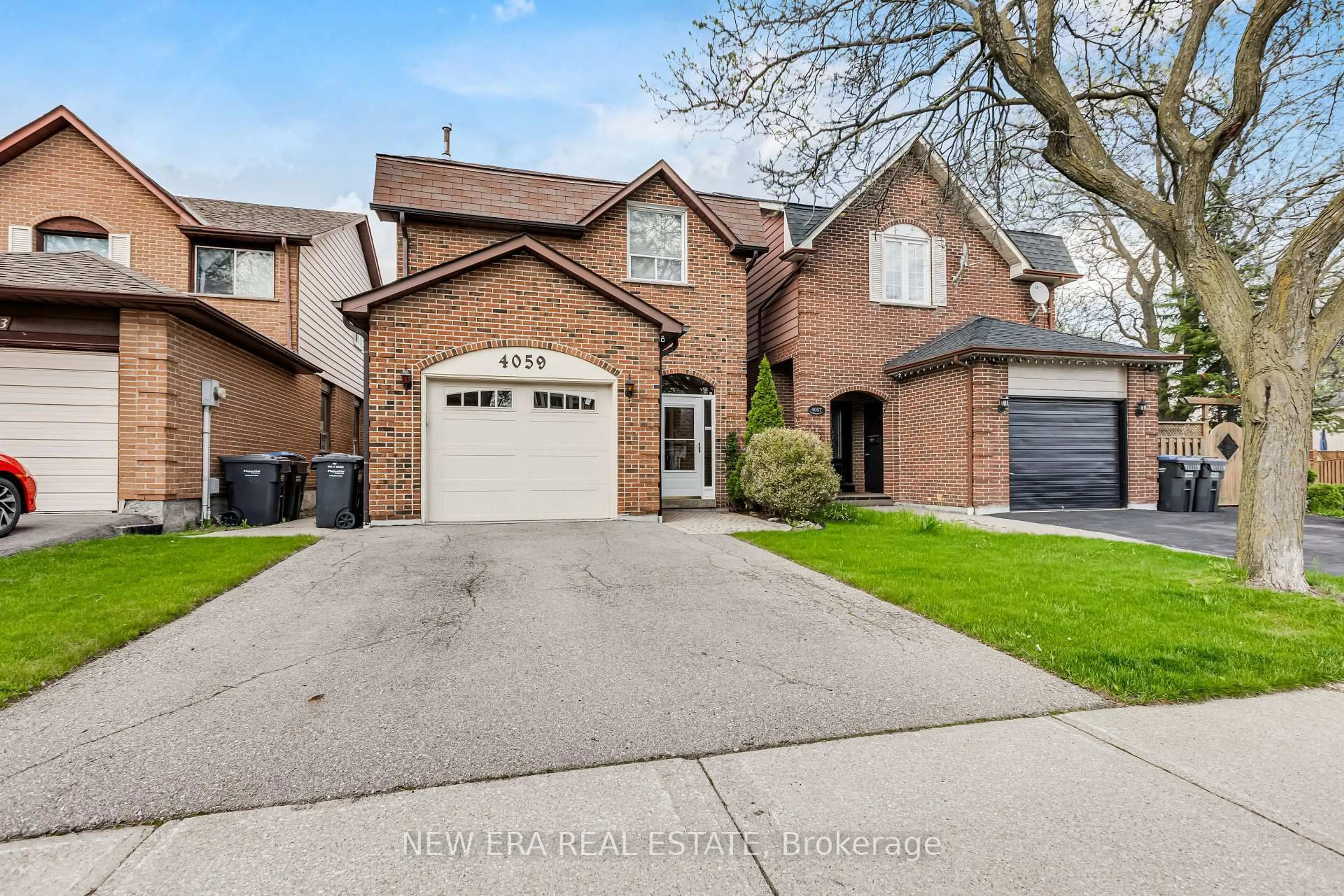 Home with brick exterior material, street for 4059 Teakwood Dr, Mississauga Ontario L5C 3L3