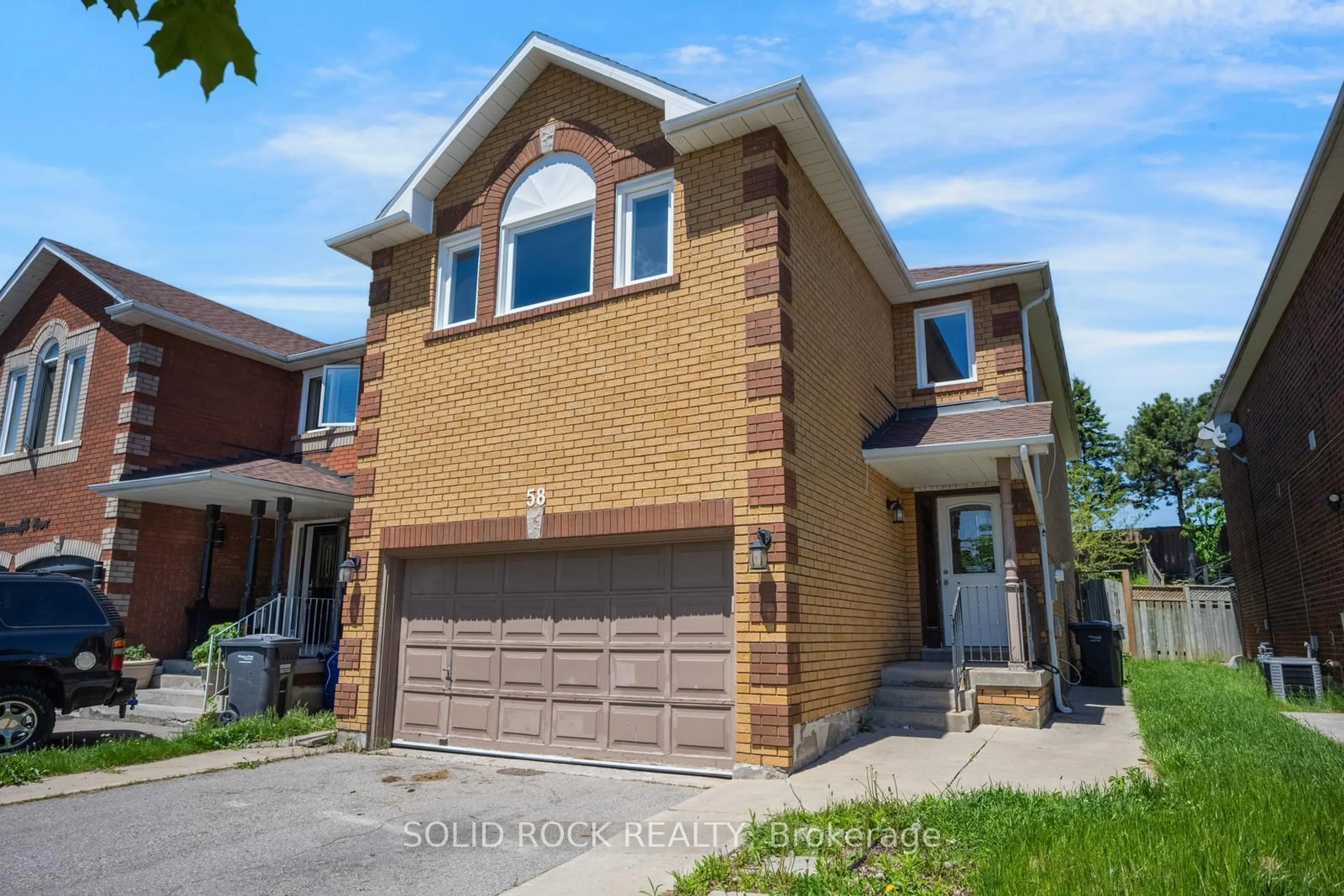 Home with brick exterior material, street for 58 Ravenscliffe Crt, Brampton Ontario L6X 4N9