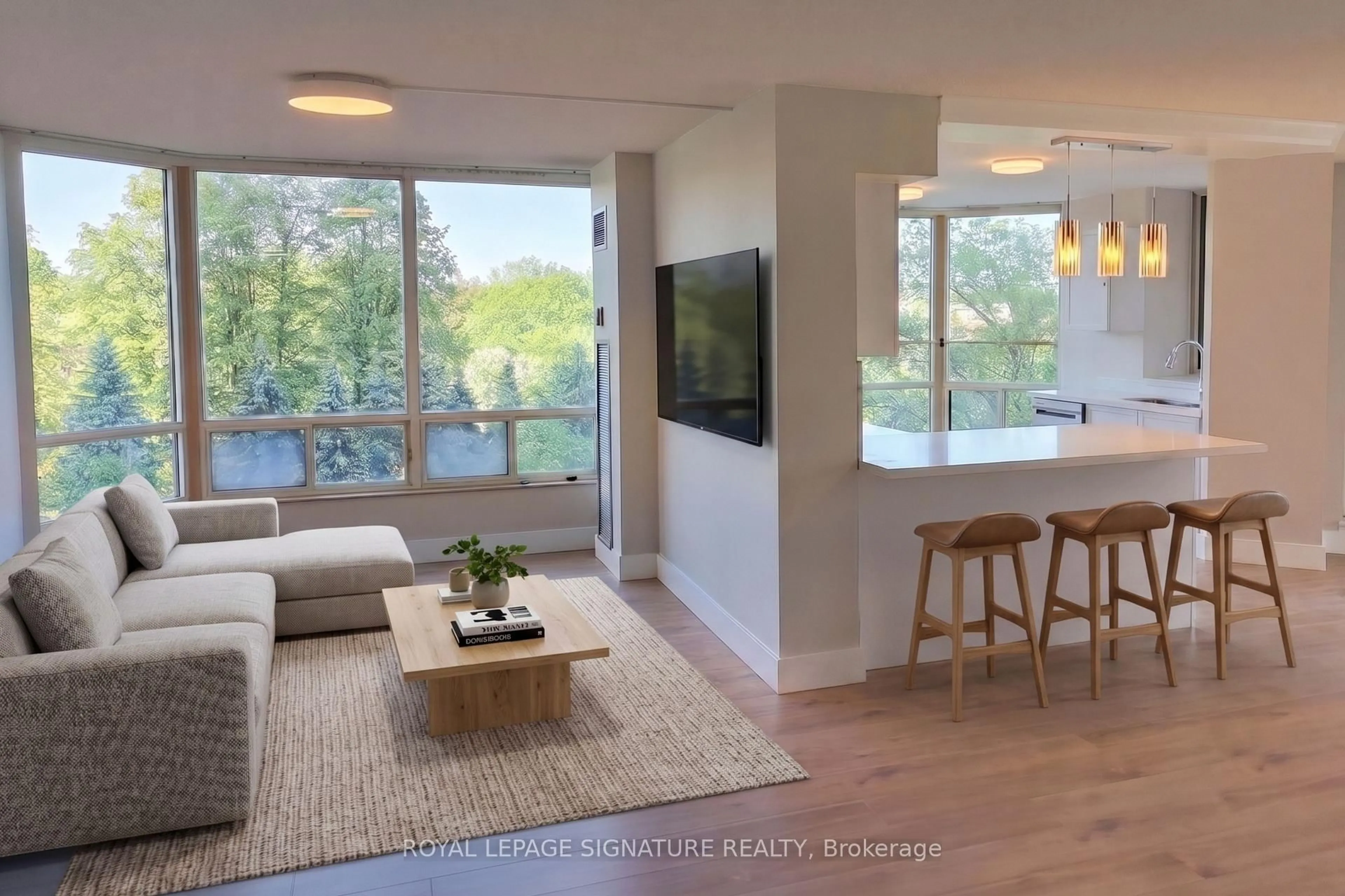 Living room with furniture, wood/laminate floor for 1300 Islington Ave #507, Toronto Ontario M9A 5C4