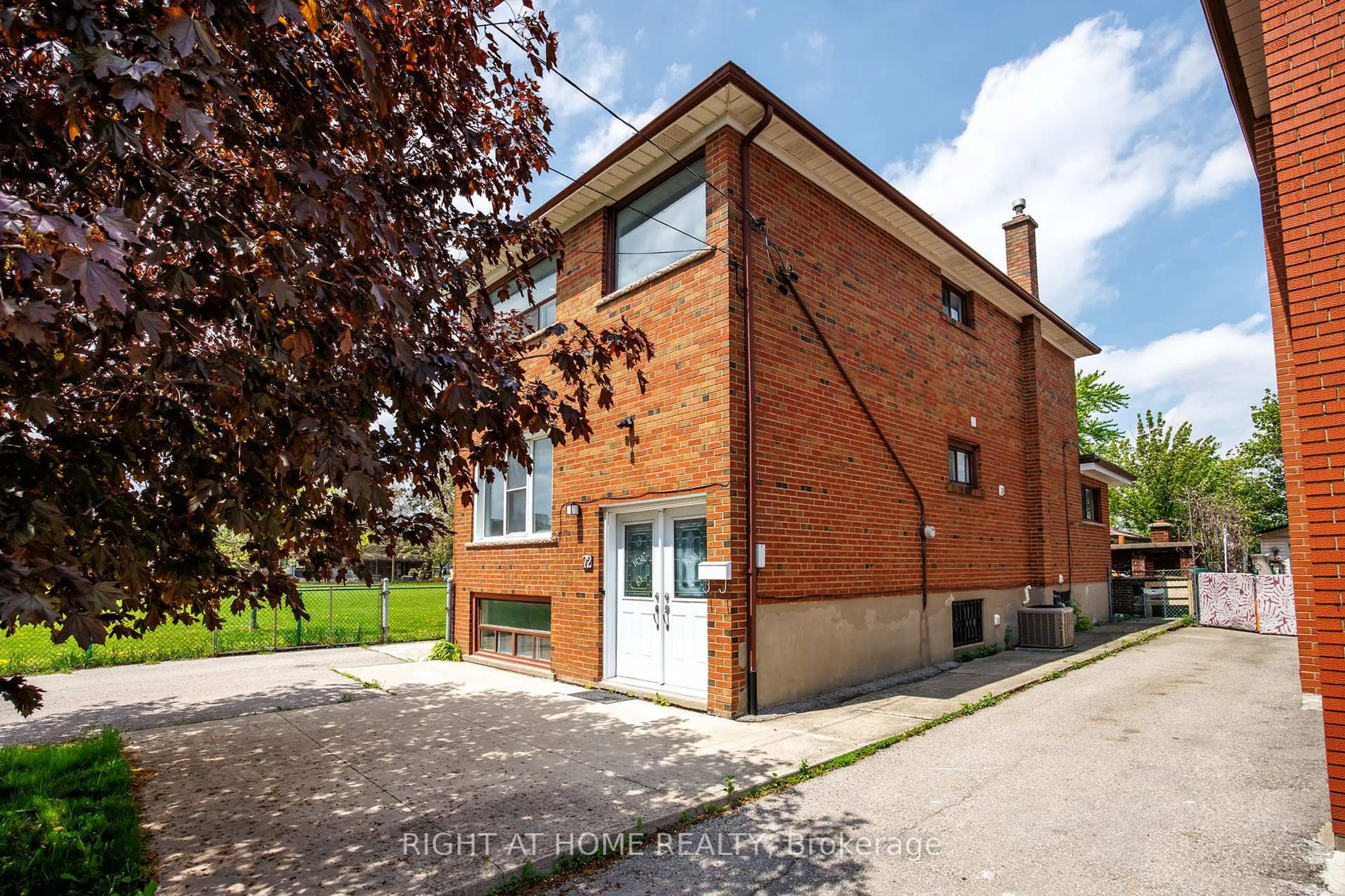 Home with brick exterior material, building for 72 Katherine Rd, Toronto Ontario M3K 1J4