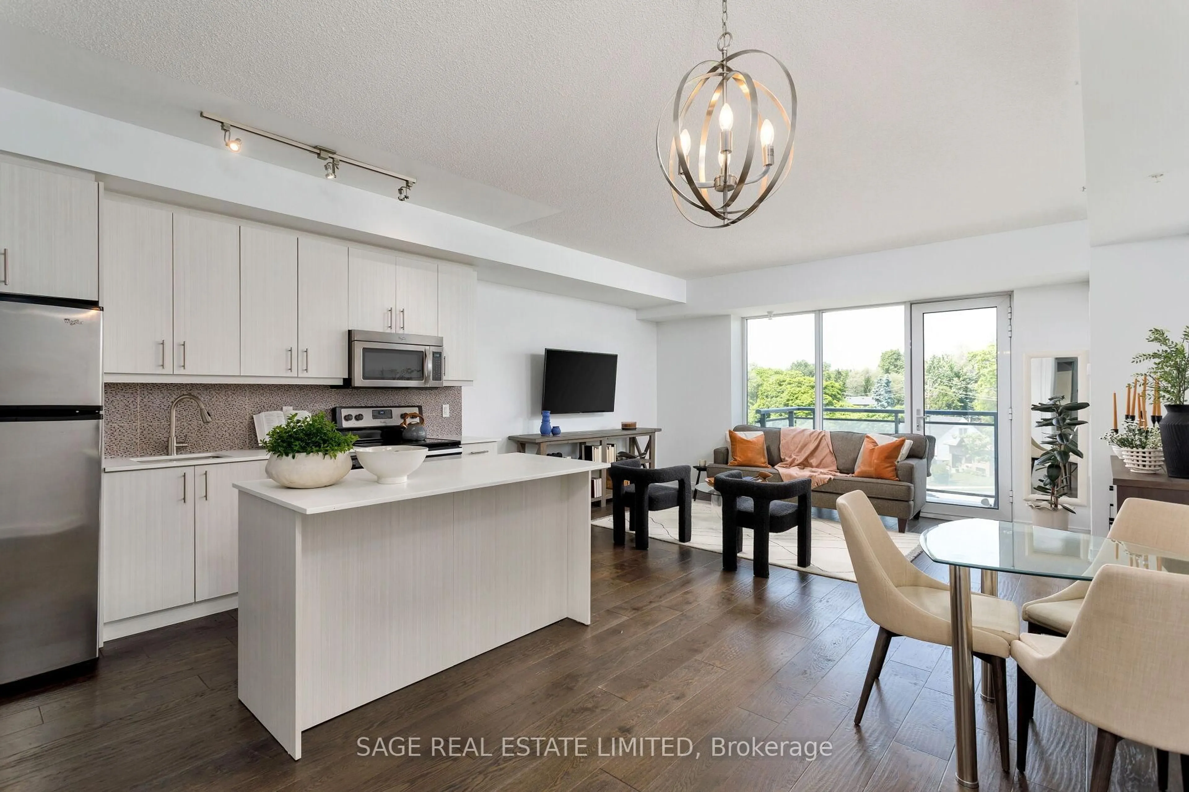 Open concept kitchen, wood/laminate floor for 760 The Queensway #401, Toronto Ontario M8Z 0E1