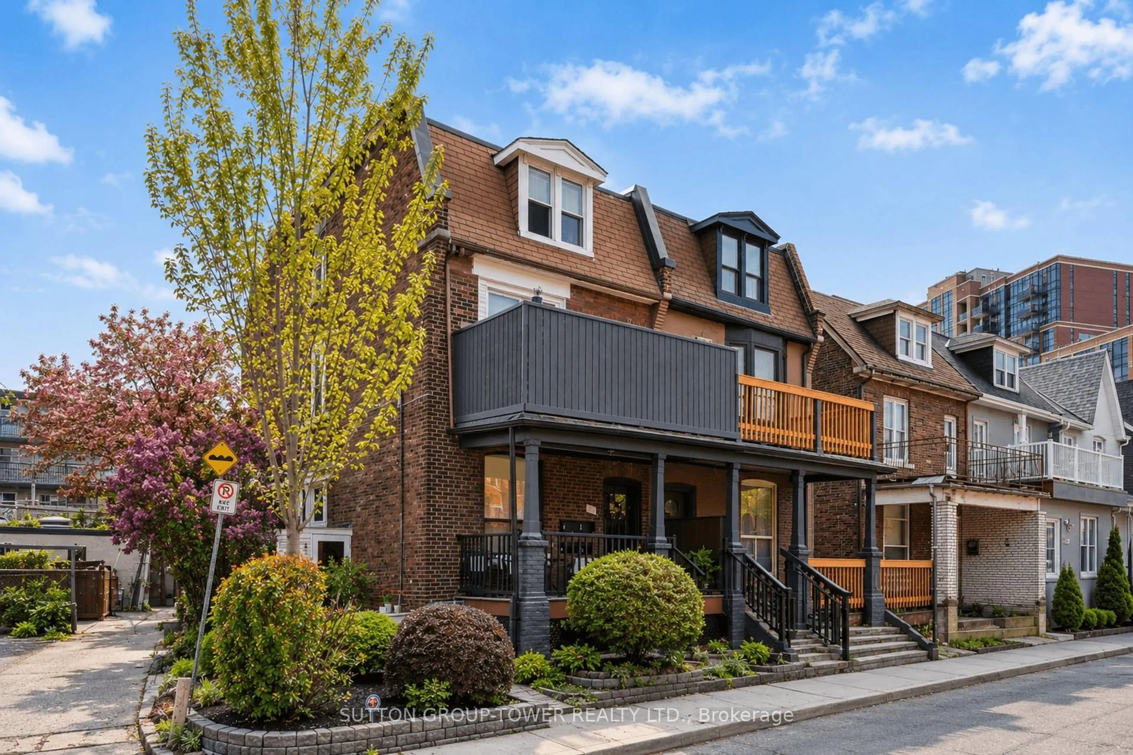 Home with brick exterior material, street for 560 Indian Grve, Toronto Ontario M6P 2J4
