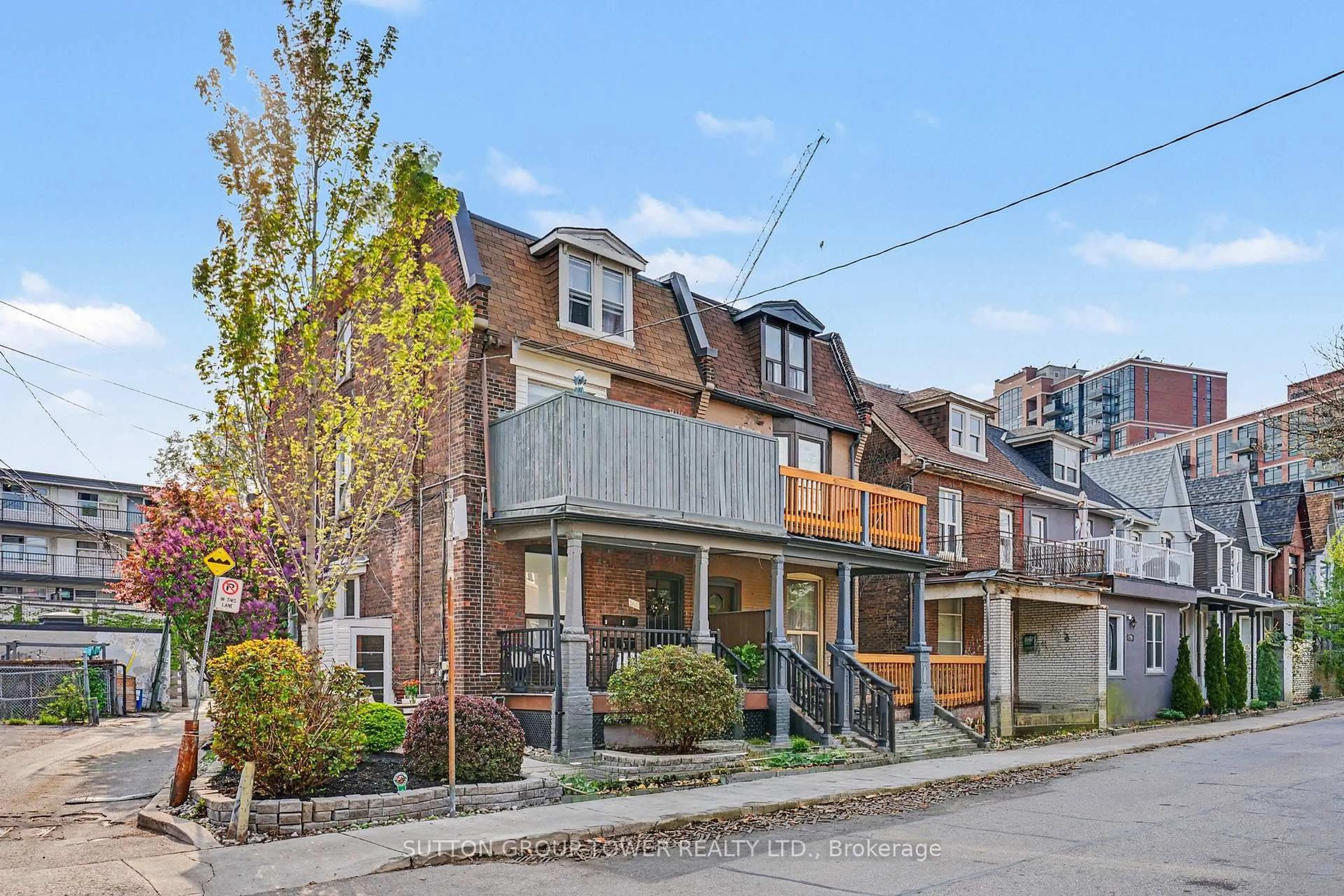 Home with brick exterior material, street for 560 Indian Grve, Toronto Ontario M6P 2J4