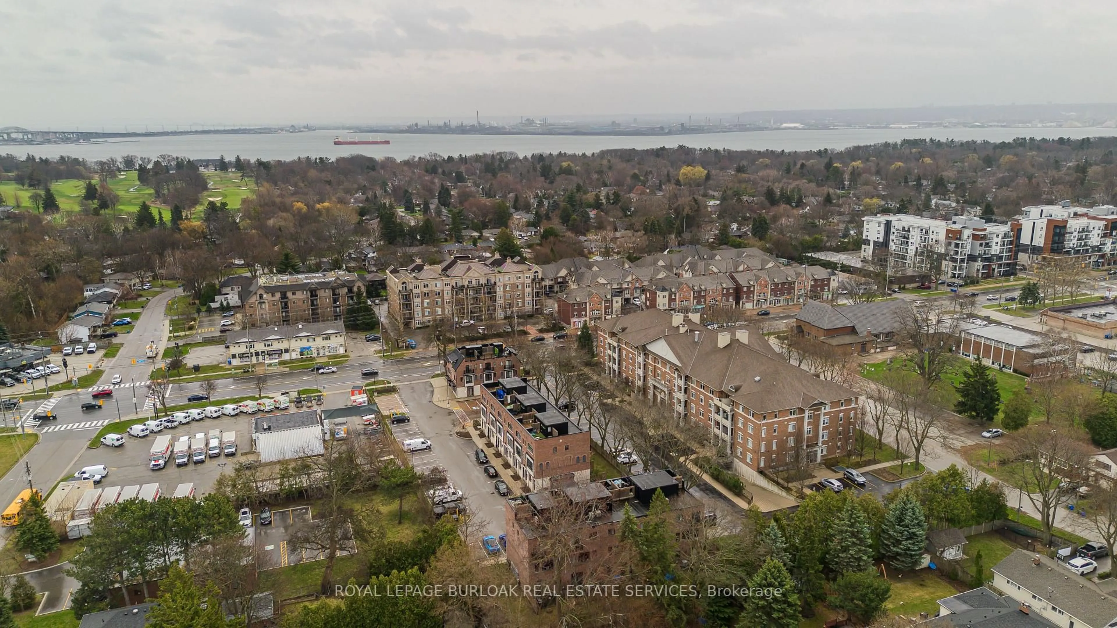 A pic from outside/outdoor area/front of a property/back of a property/a pic from drone, water/lake/river/ocean view for 391 Plains Rd #412, Burlington Ontario L7T 4M2