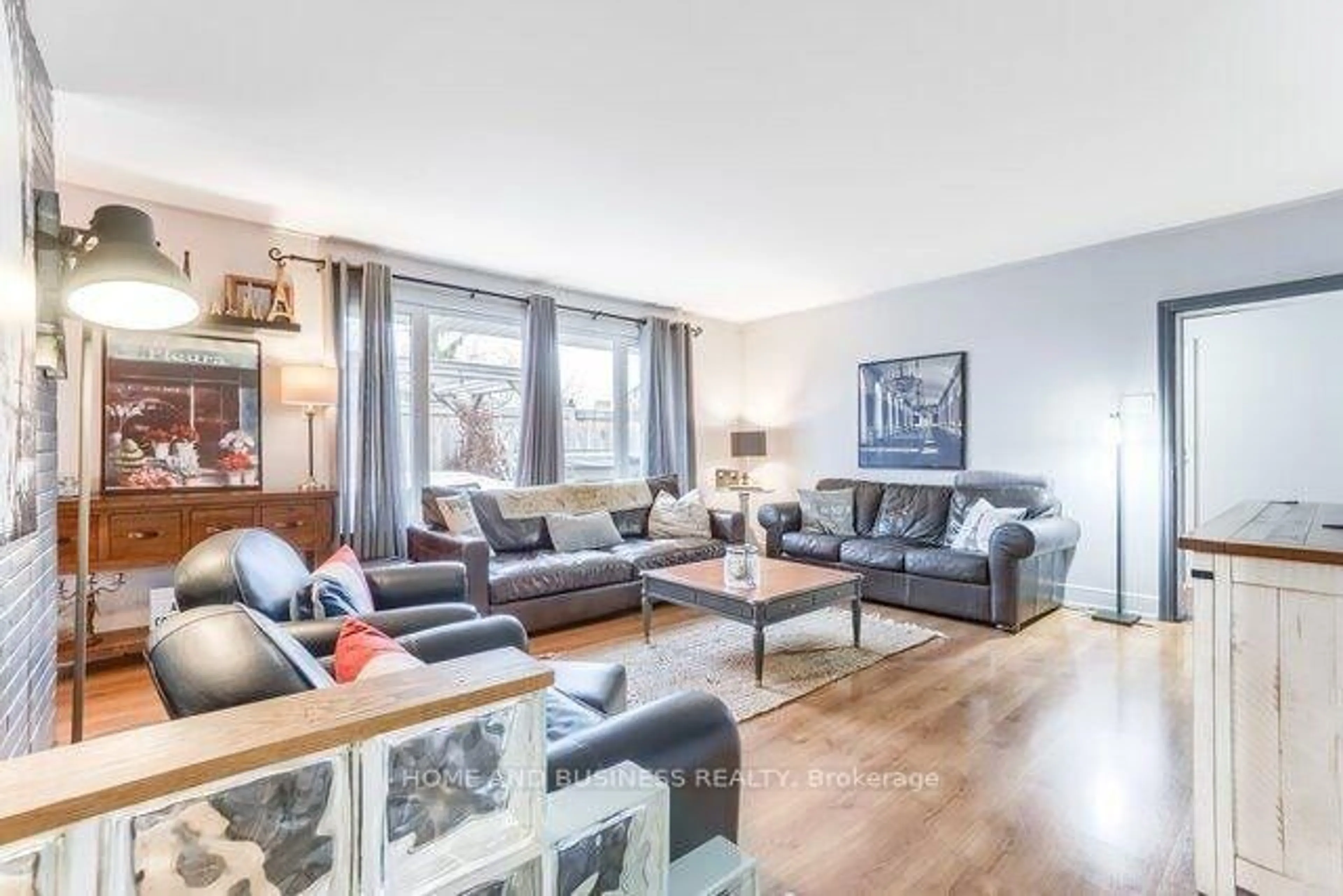 Living room with furniture, wood/laminate floor for 8 Sora Dr, Mississauga Ontario L5M 1B2