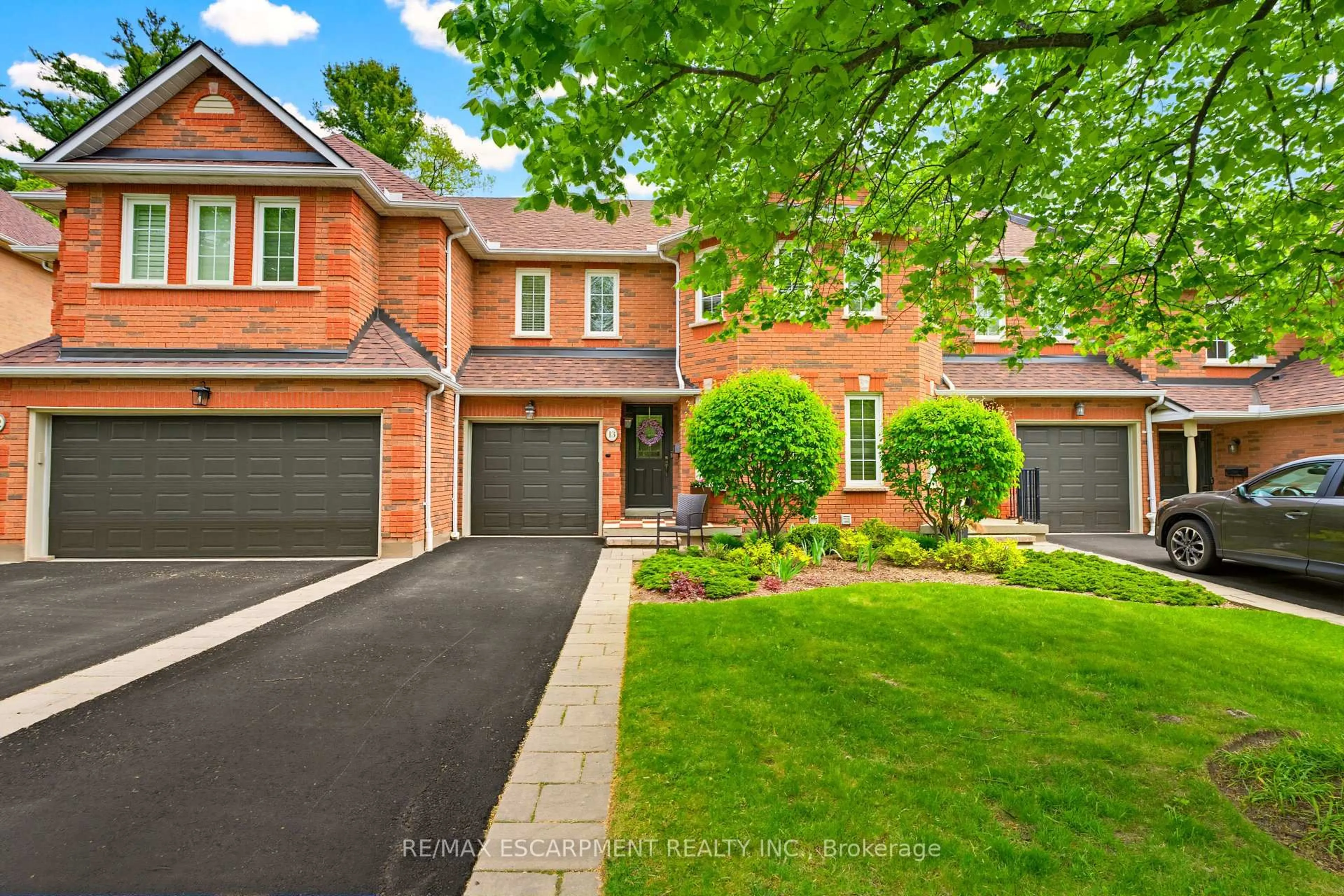 Home with brick exterior material, street for 1735 The Collegeway #13, Mississauga Ontario L5L 3S7