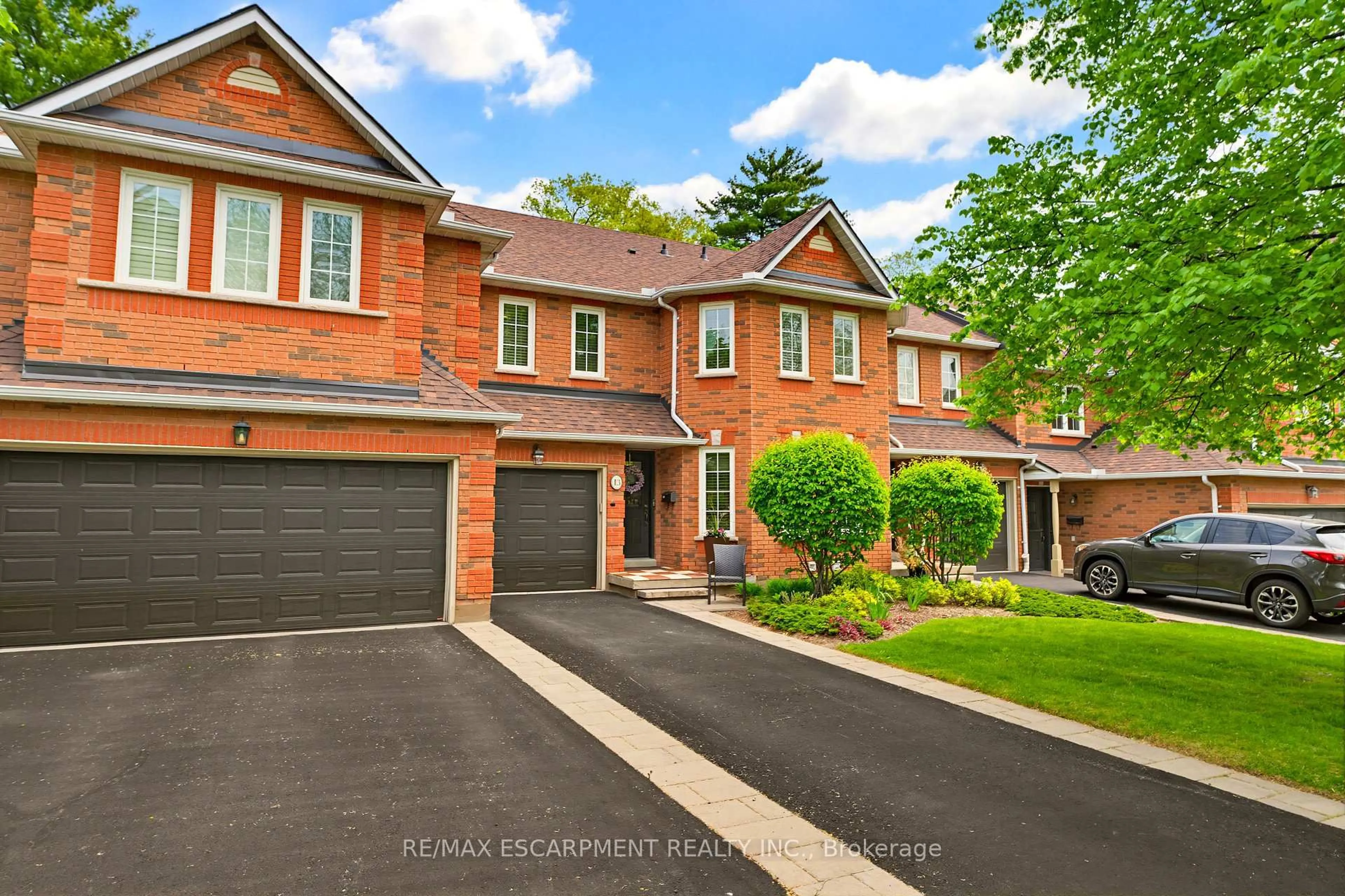Home with brick exterior material, street for 1735 The Collegeway #13, Mississauga Ontario L5L 3S7