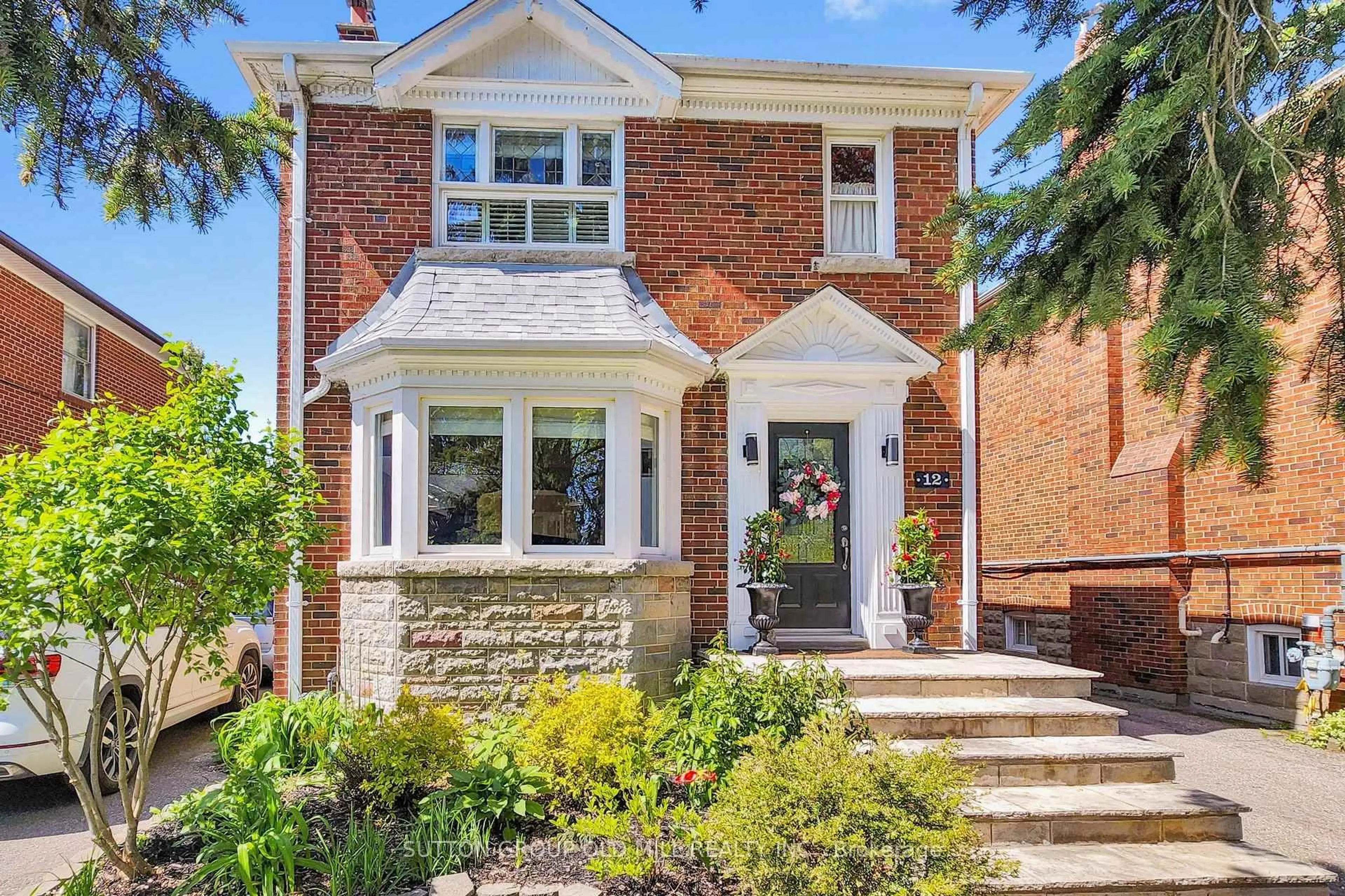 Home with brick exterior material, street for 12 Jasmine Ave, Toronto Ontario M8W 1C5