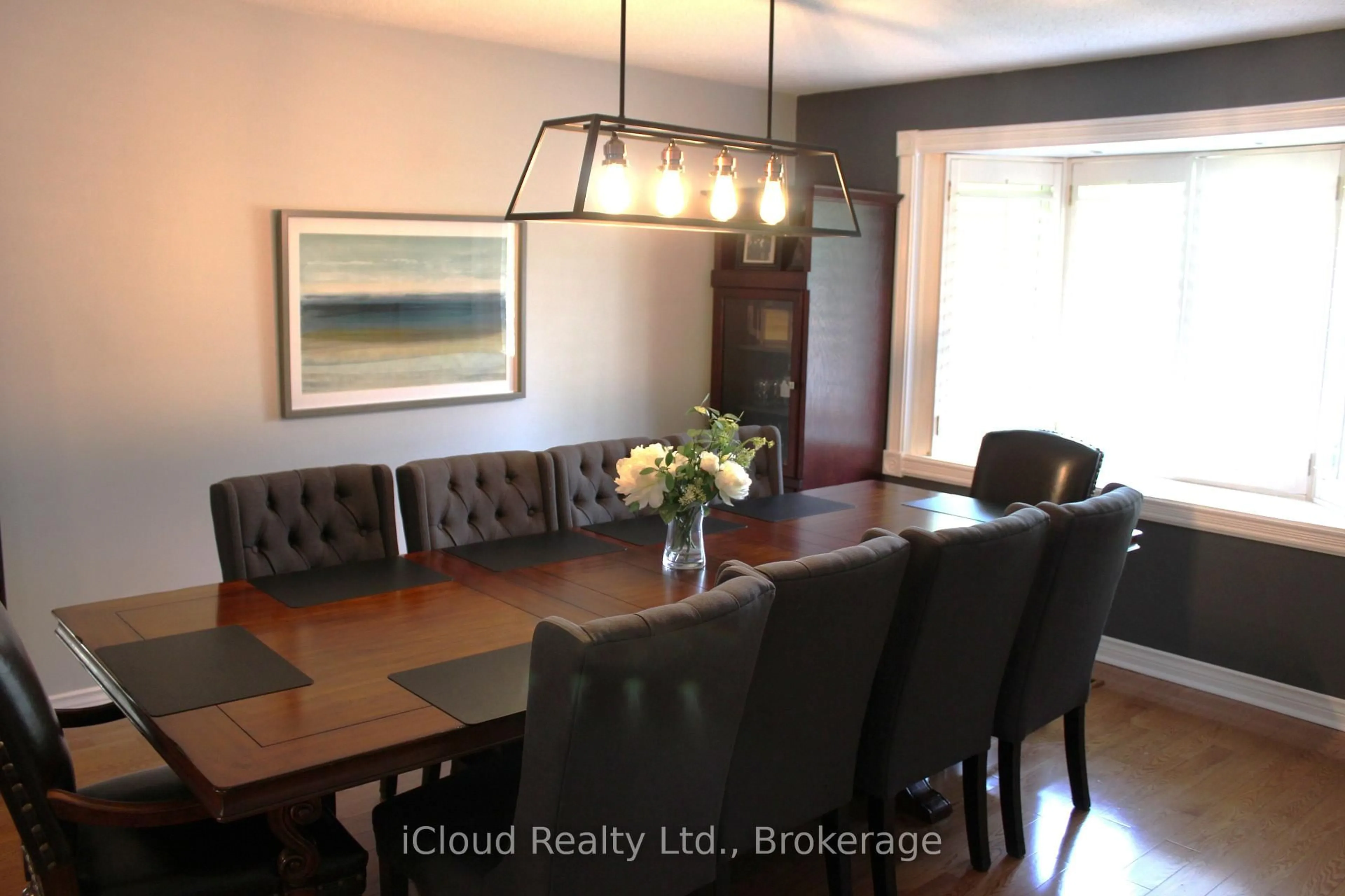 Dining room, wood/laminate floor for 679 harrison Rd, Milton Ontario L9T 4S7