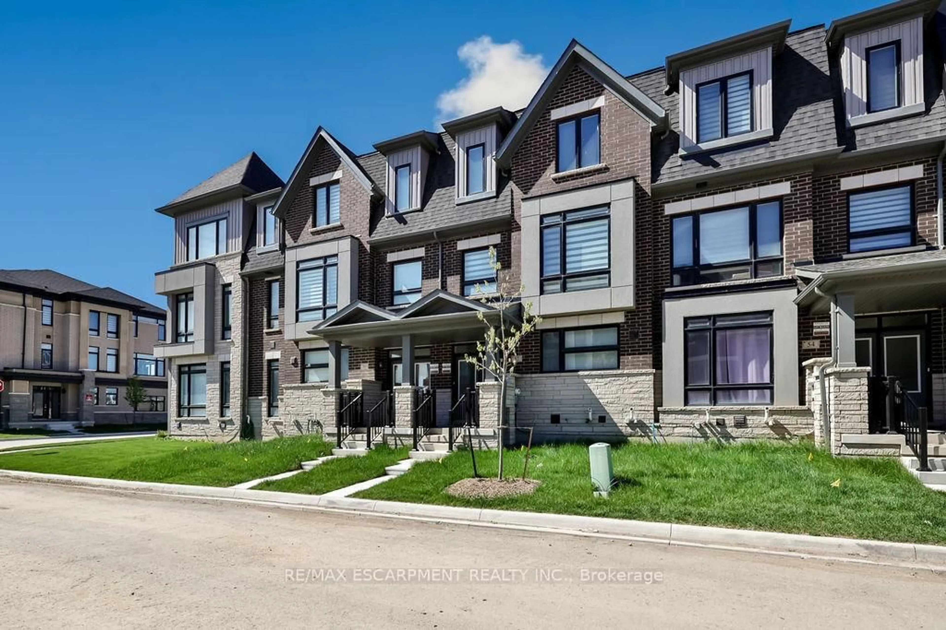 Home with brick exterior material, street for 52 Bonnington Dr, Brampton Ontario L7A 5M1