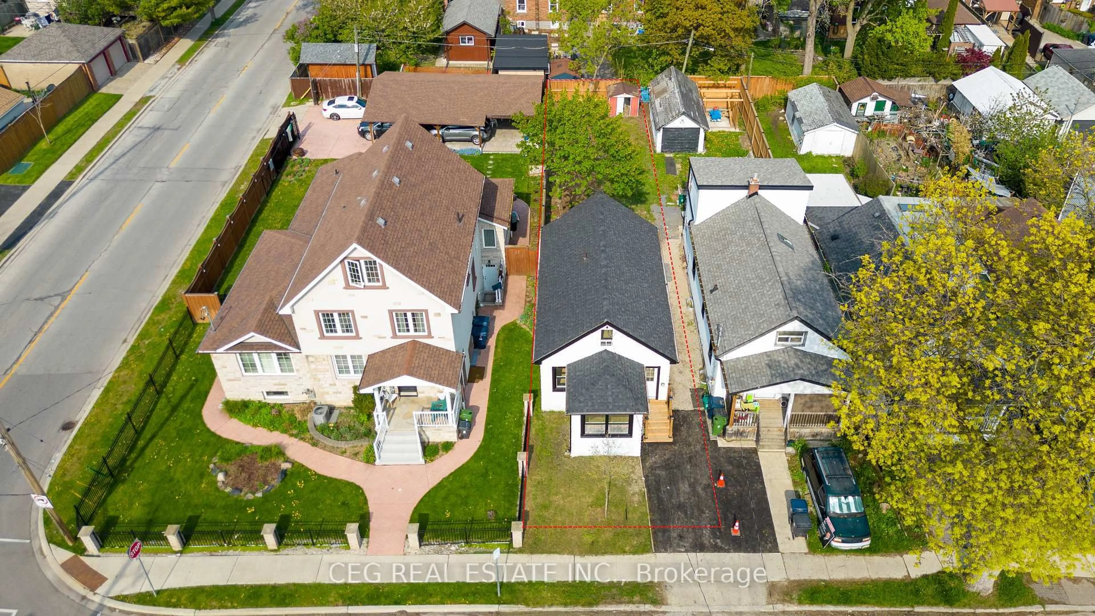 A pic from outside/outdoor area/front of a property/back of a property/a pic from drone, street for 53 Twenty Fourth St, Toronto Ontario M8V 3N3