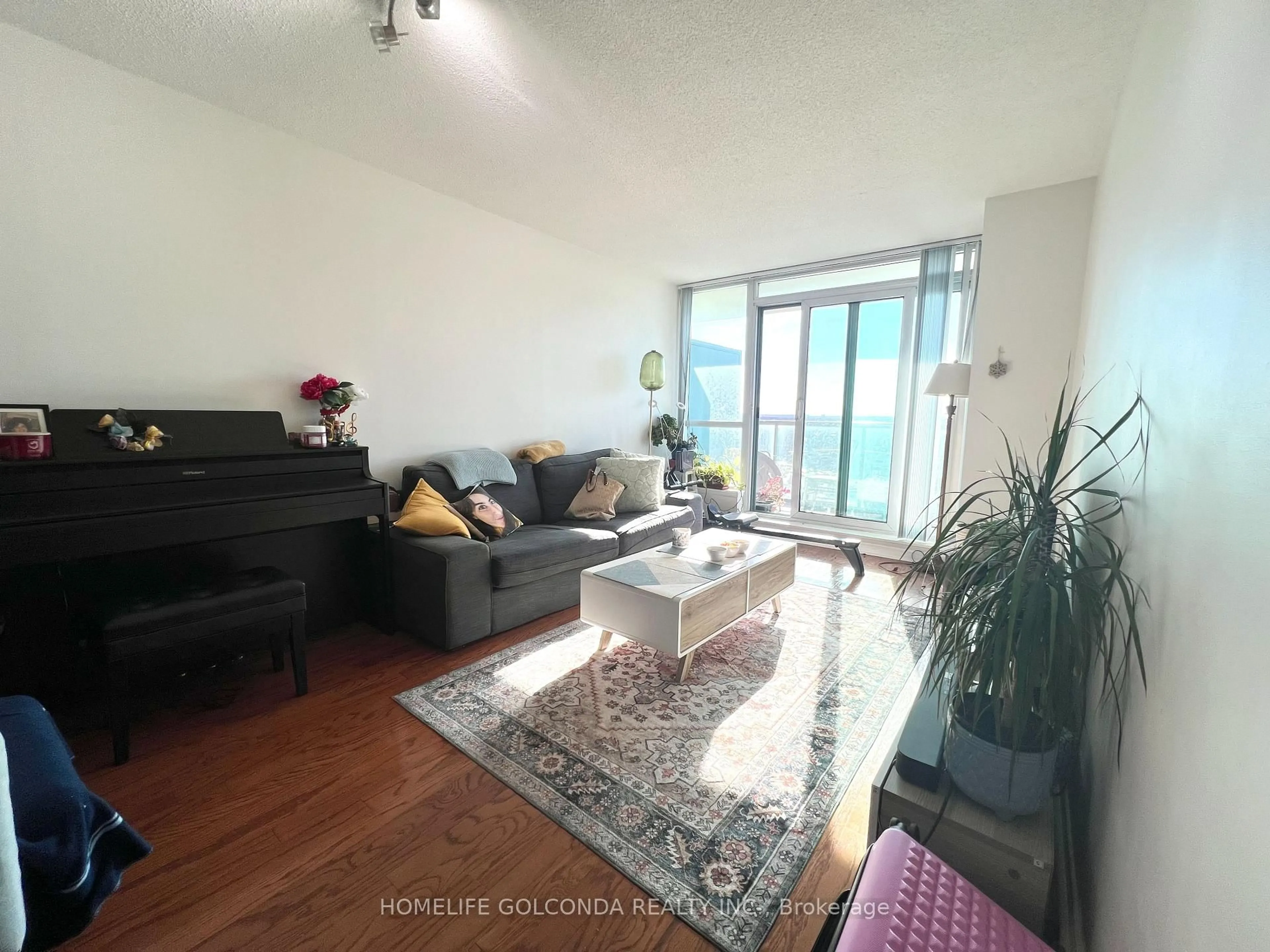 Living room with furniture, unknown for 4879 Kimbermount Ave #1602, Mississauga Ontario L5M 7R8
