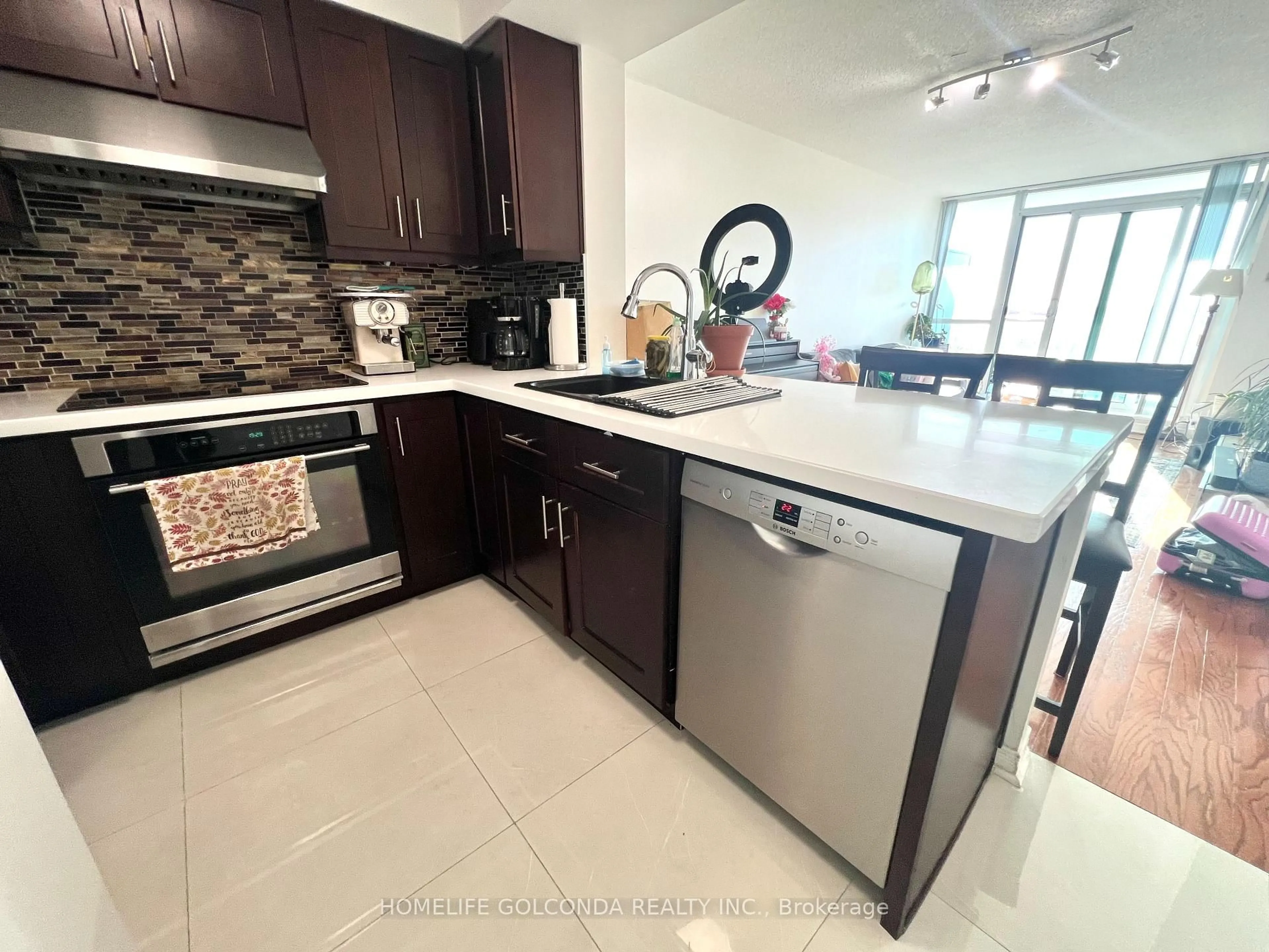 Open concept kitchen, ceramic/tile floor for 4879 Kimbermount Ave #1602, Mississauga Ontario L5M 7R8