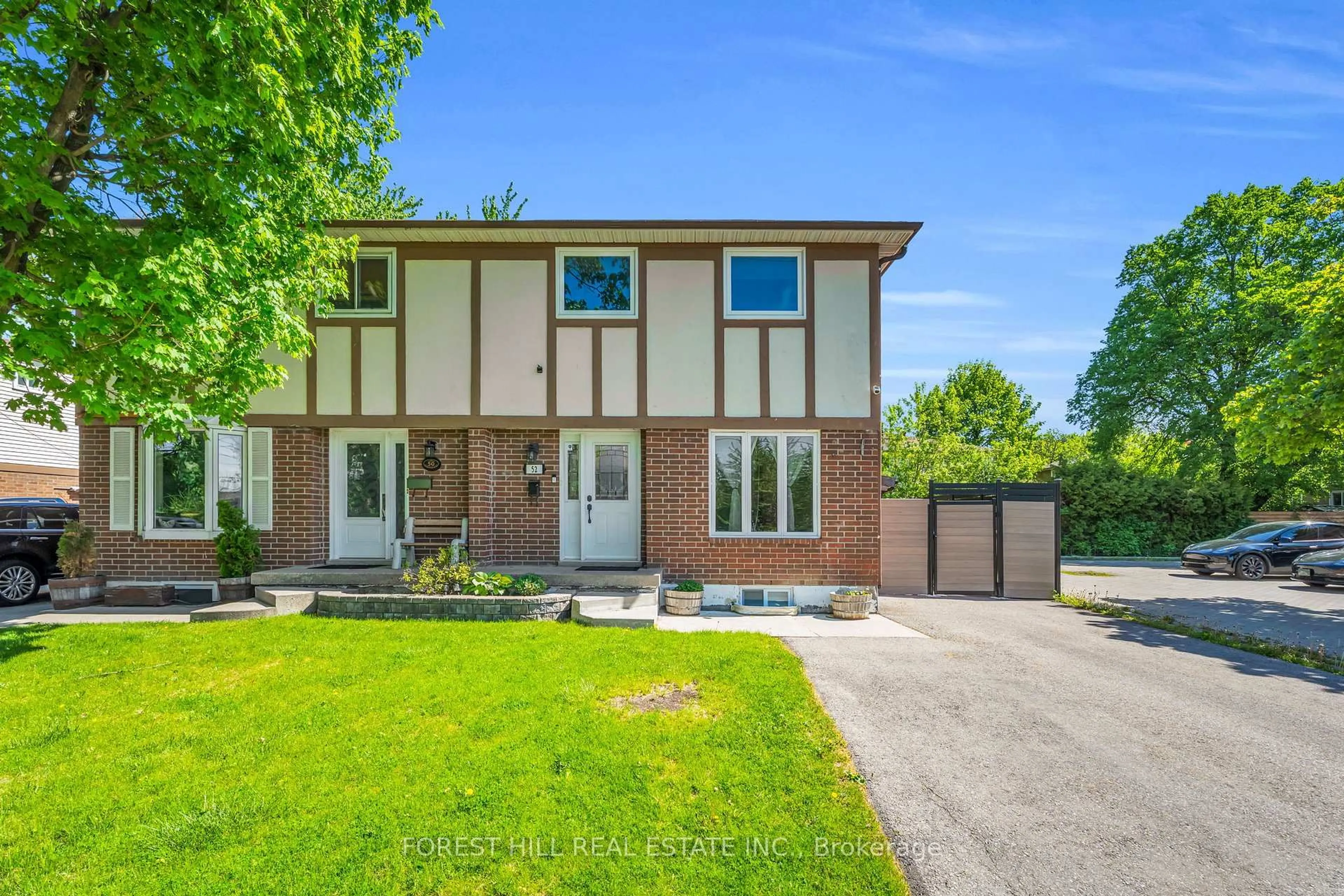Home with brick exterior material, street for 52 Mcmurchy Ave, Brampton Ontario L6Y 1Y4