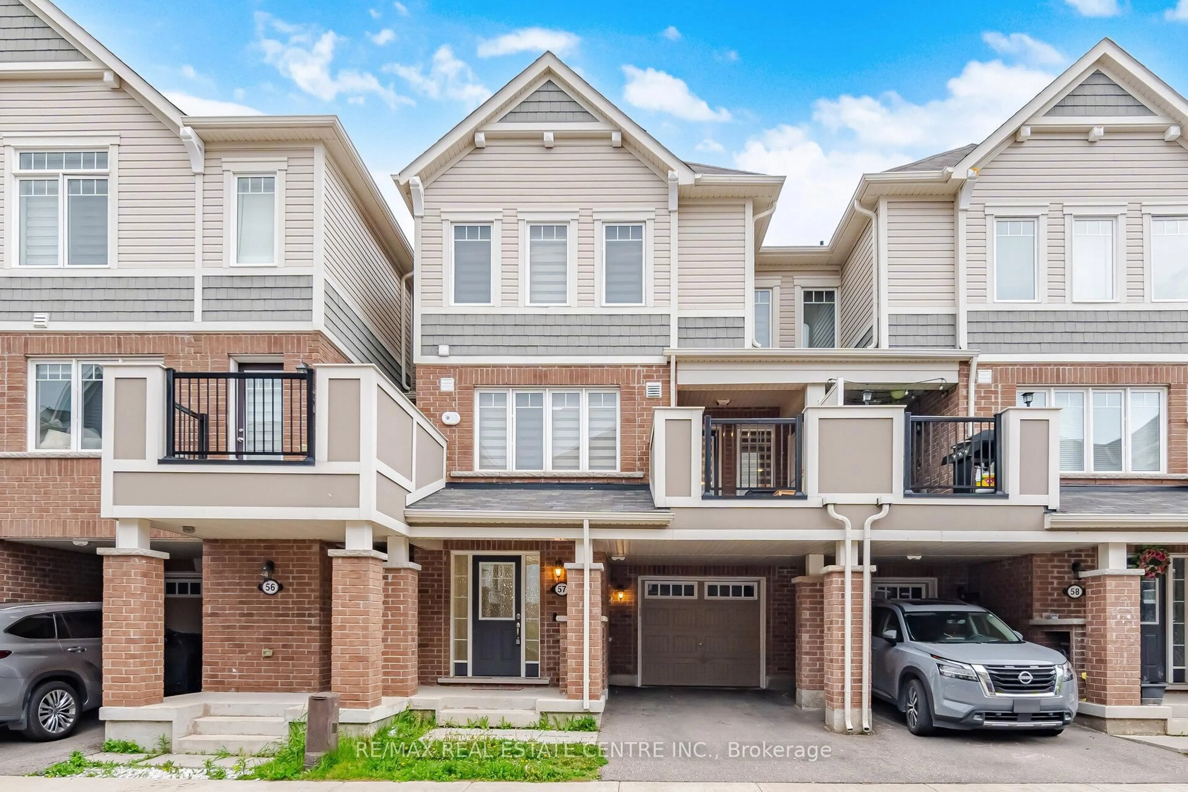 Home with brick exterior material, street for 1000 Asleton Blvd #57, Milton Ontario L5M 7P7